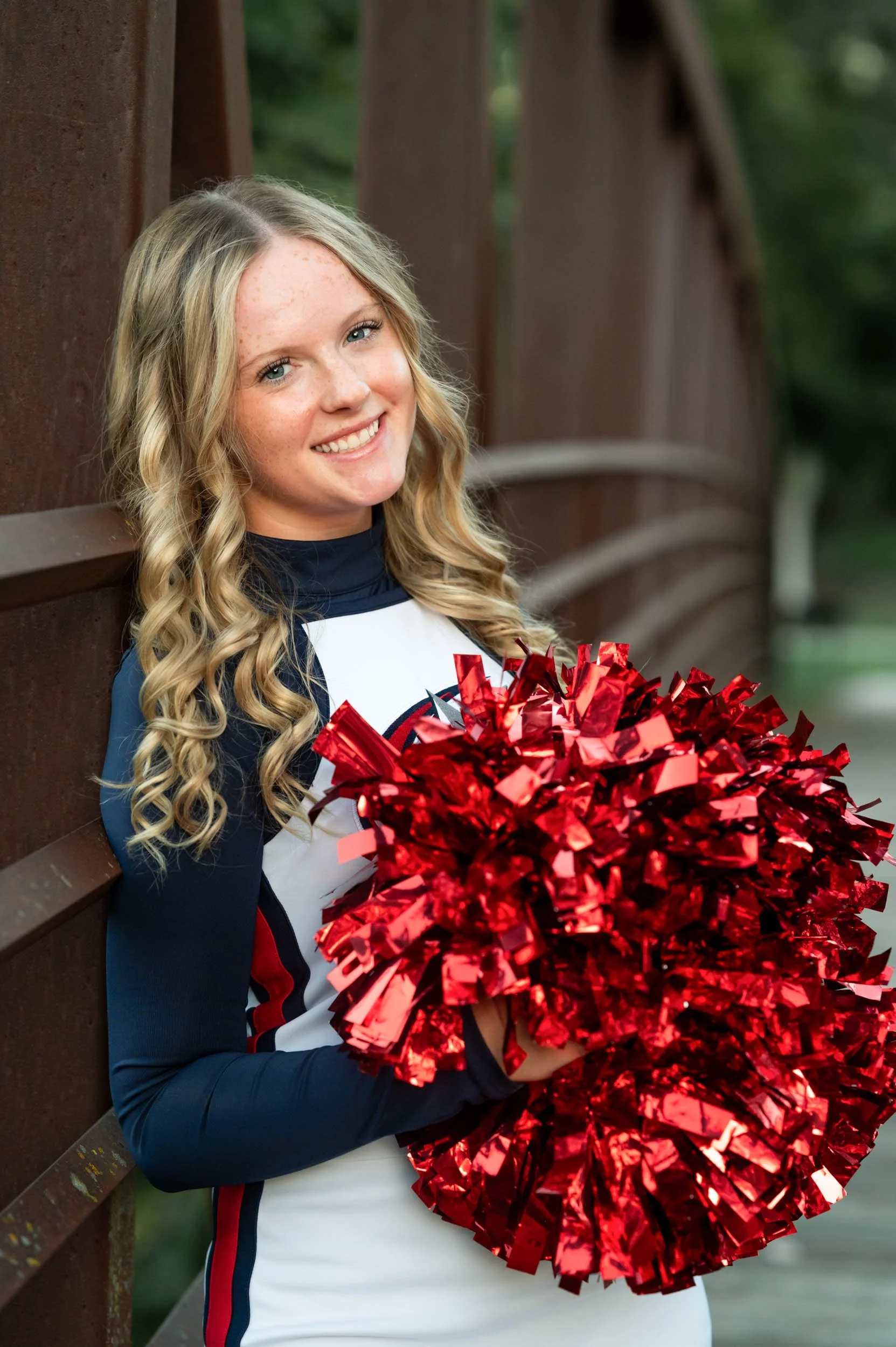senior-girl-cheer-bridge.jpg