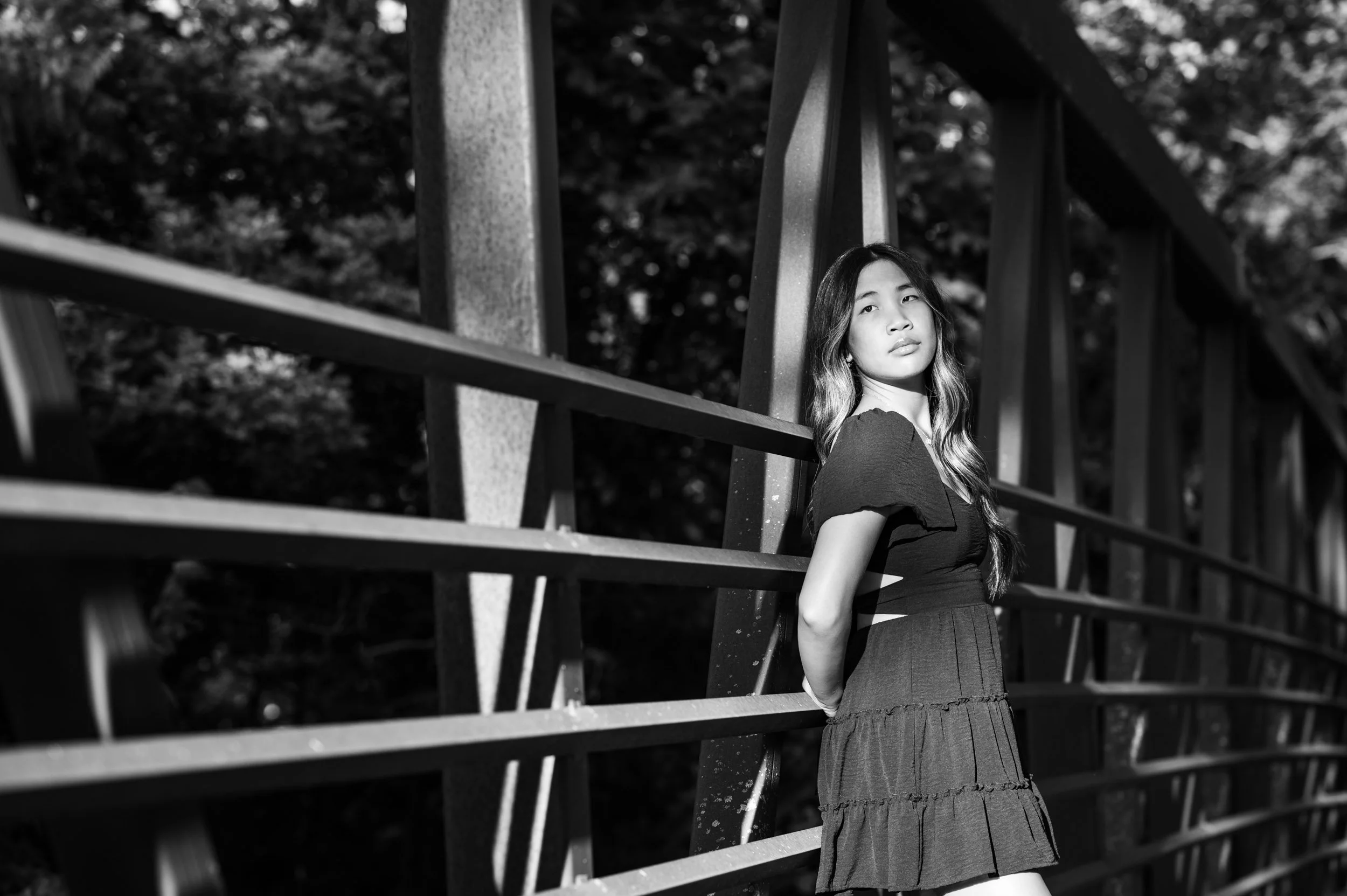teen-girl-leaning-bridge-black-white.jpg