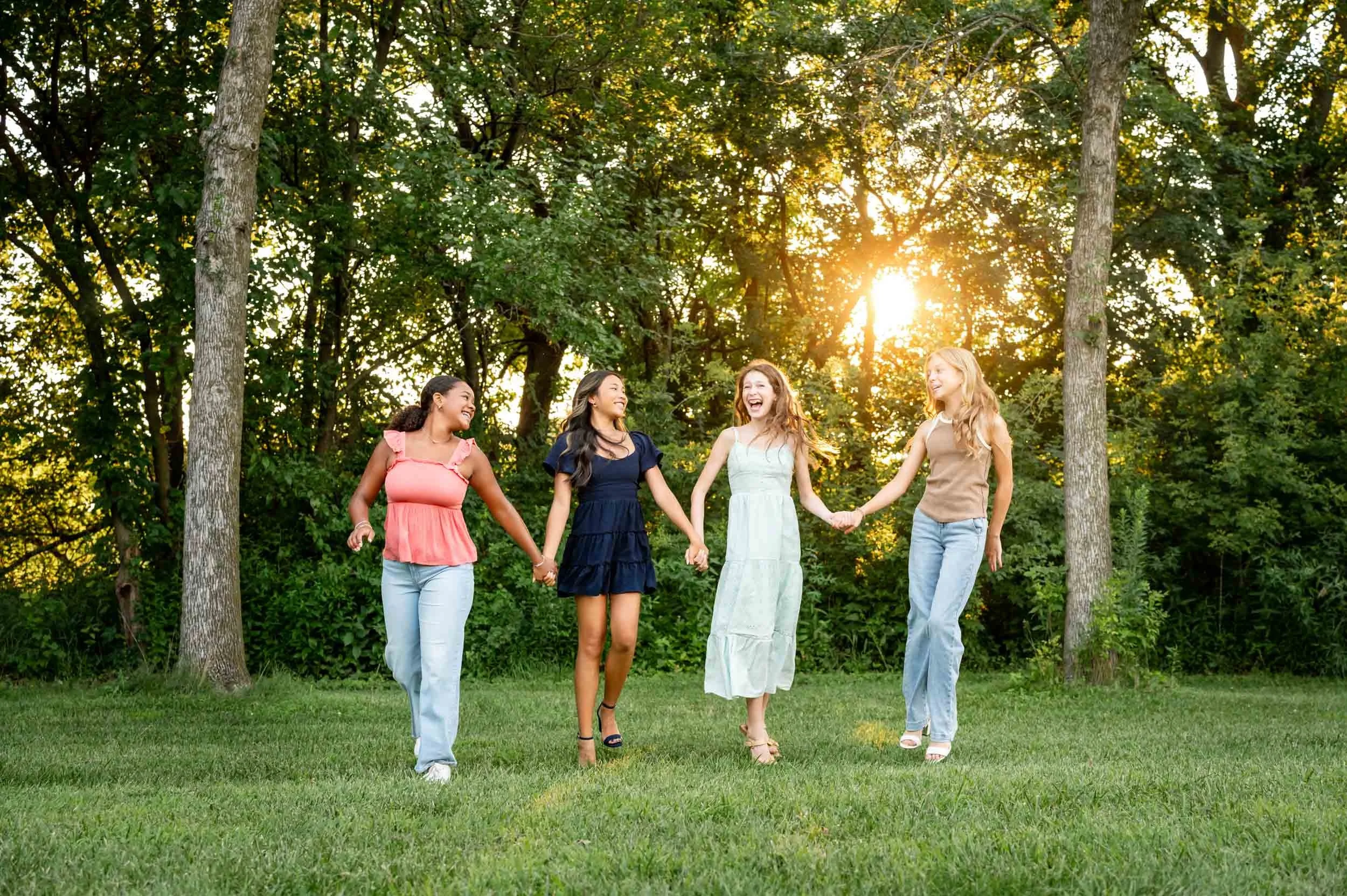 camp-cherished-group-walking-laughing-golden-light.jpg