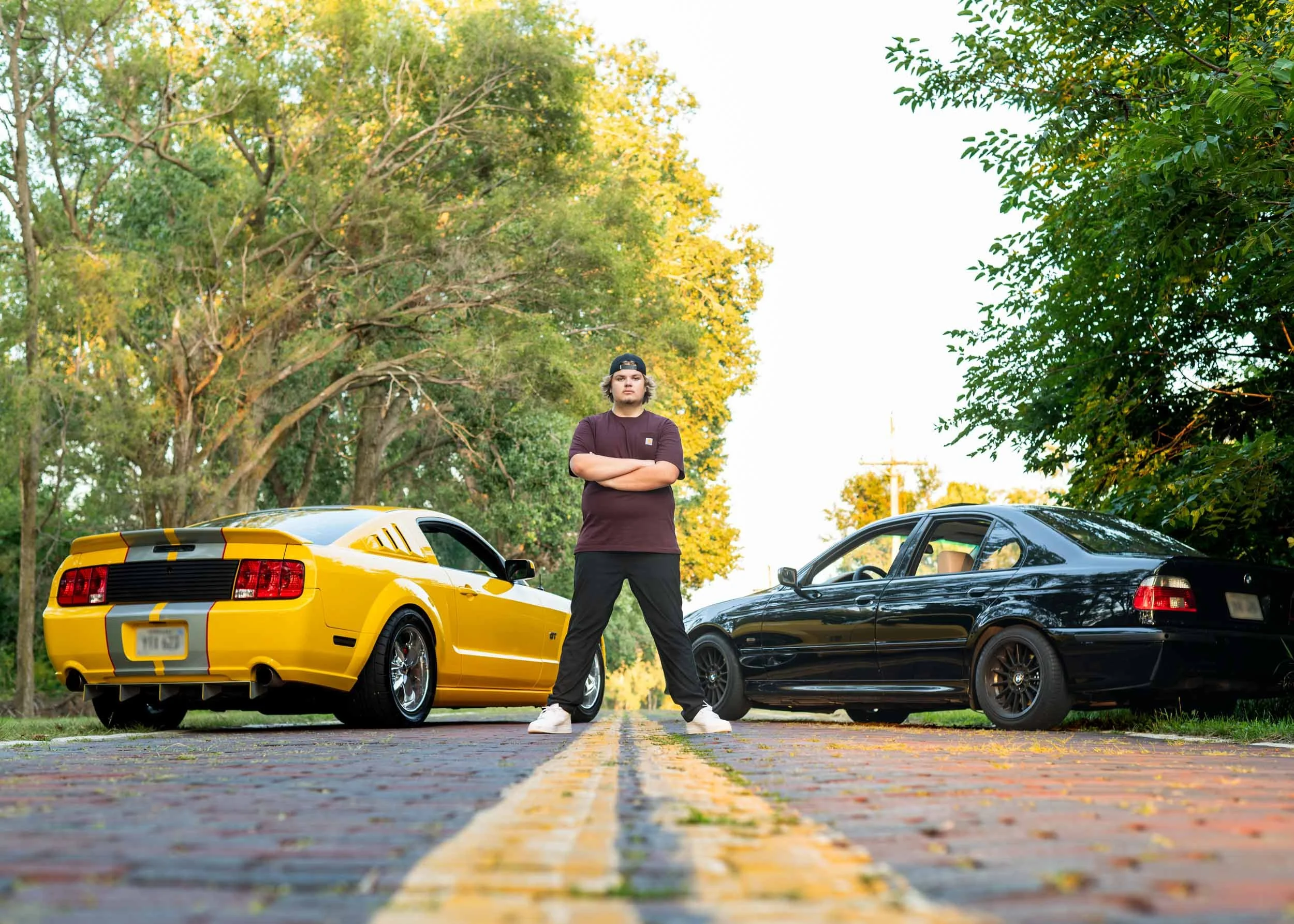 senior-guy-mustang-bmw-old-brick-road.jpg