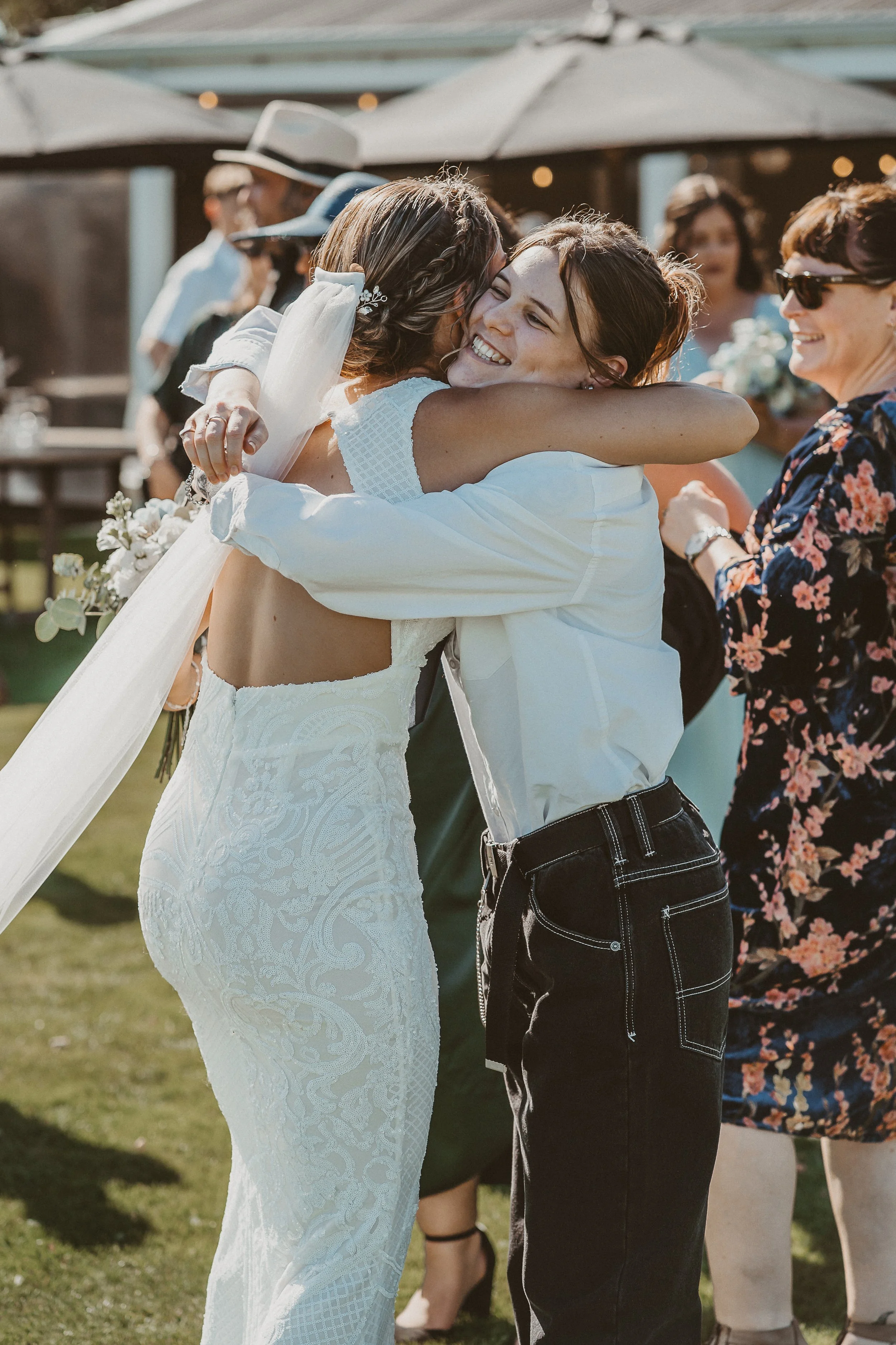 Bride hugging her friend