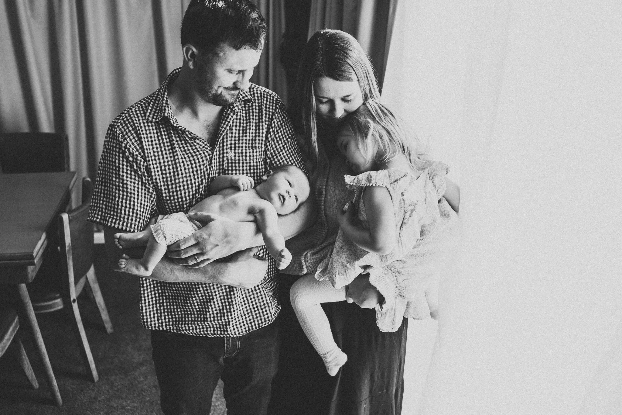 Lifestyle family photo with newborn.
