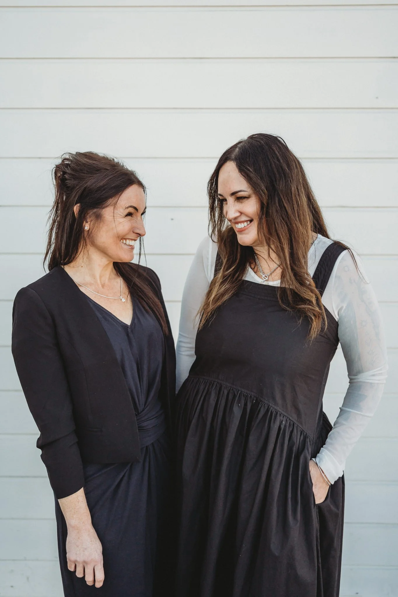 Headshot of two women in business
