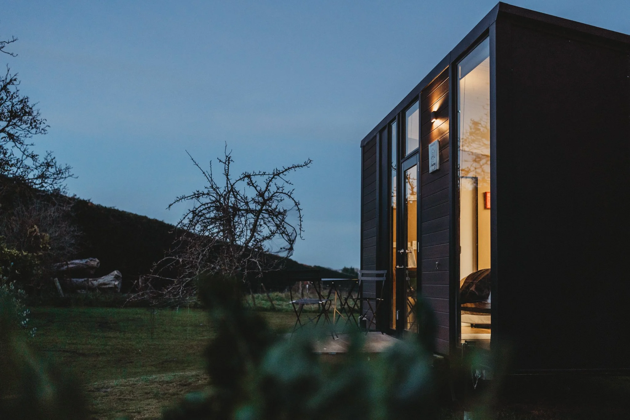 Tiny away accommodation captured at blue hour