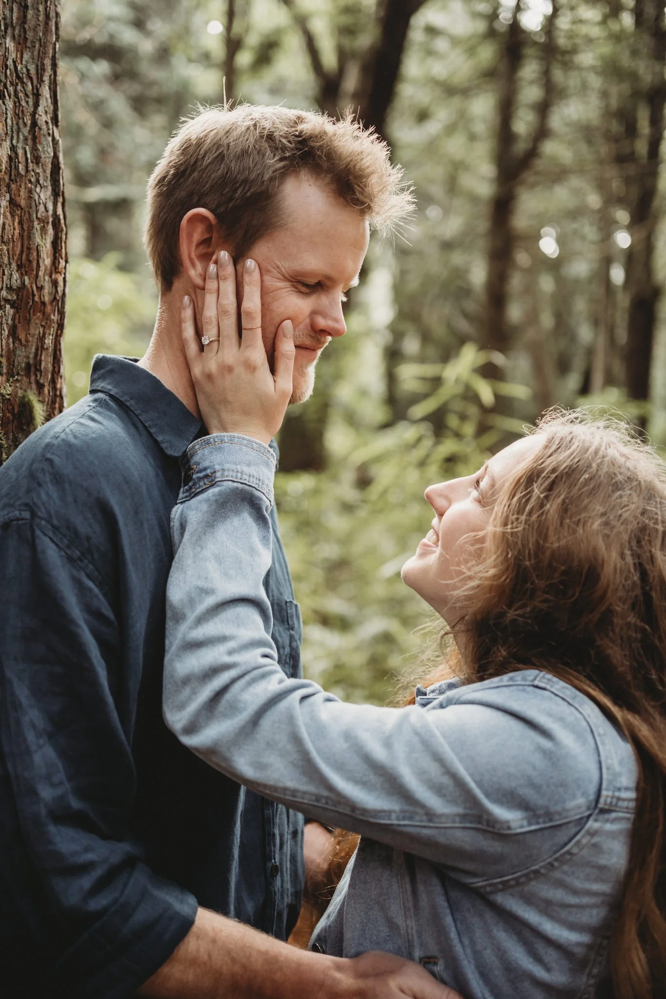 Fiancé touching the cheek of her husband-to-be