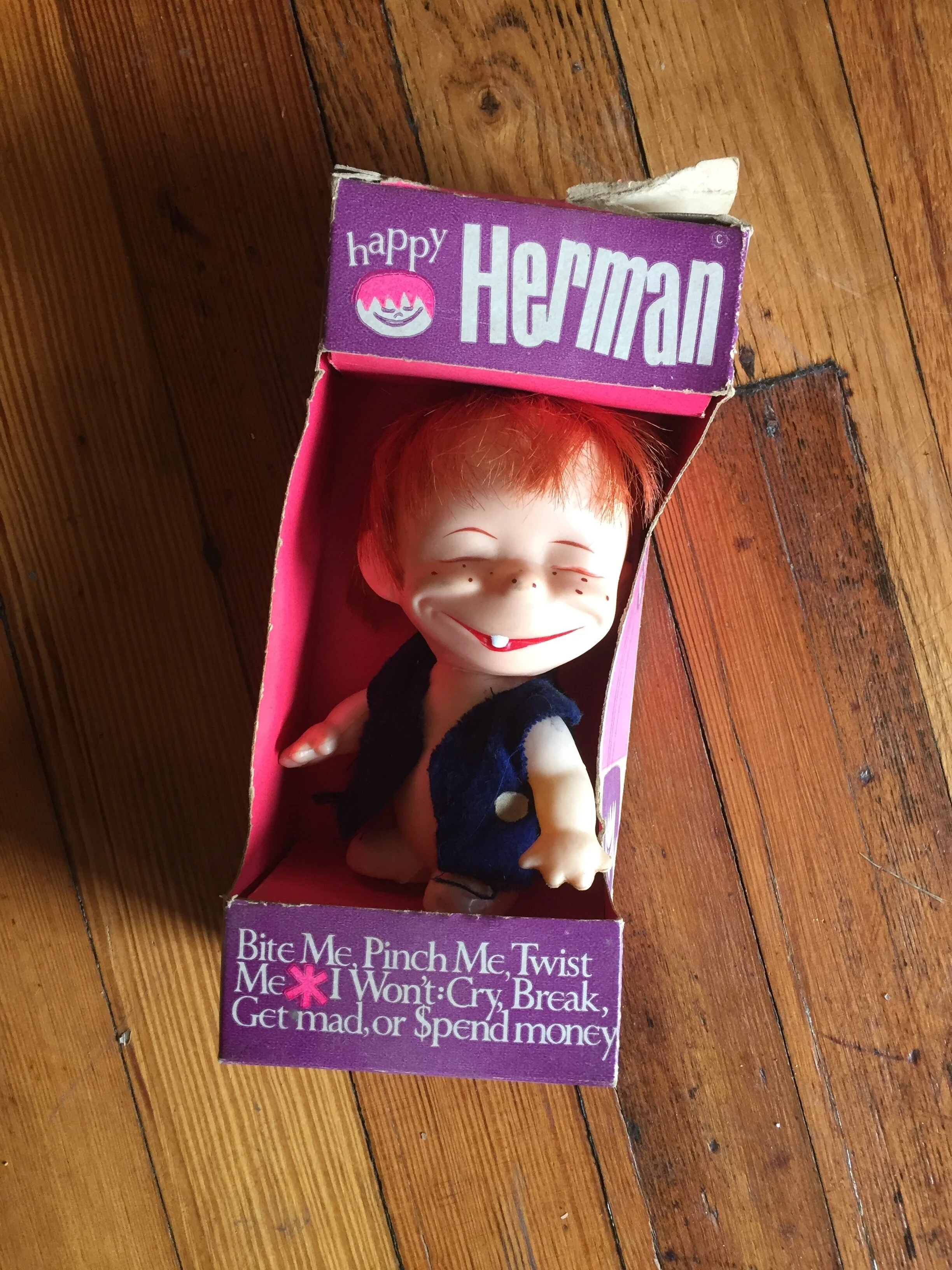 Happy Herman Doll