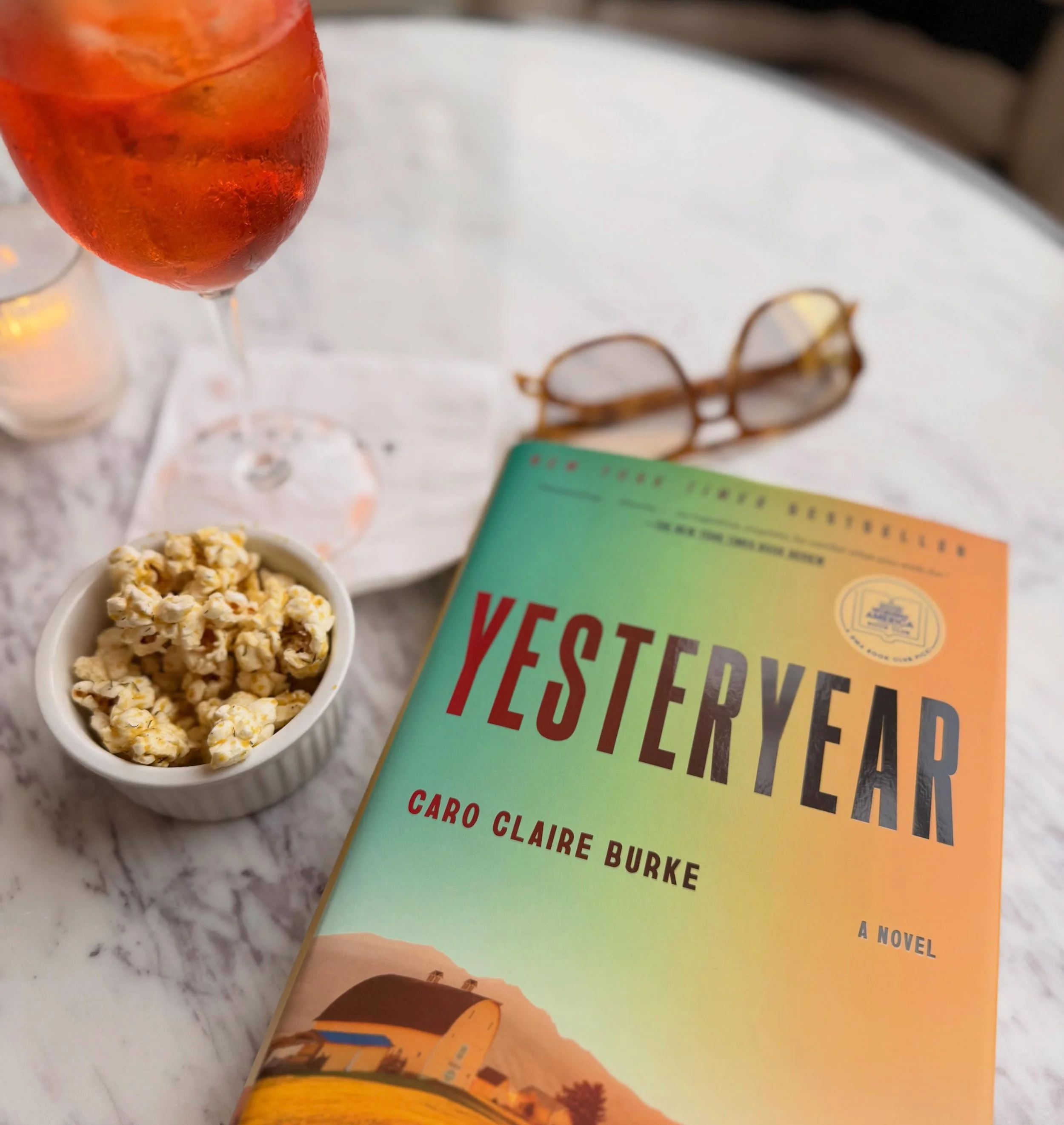 Aperol spritz at @farinerthewinebar + a new book = perfect rainy summer evening. Need a copy of the new Yesteryear by @caroclaireburke &hellip; we&rsquo;ve got &lsquo;em in our book nook. 😉