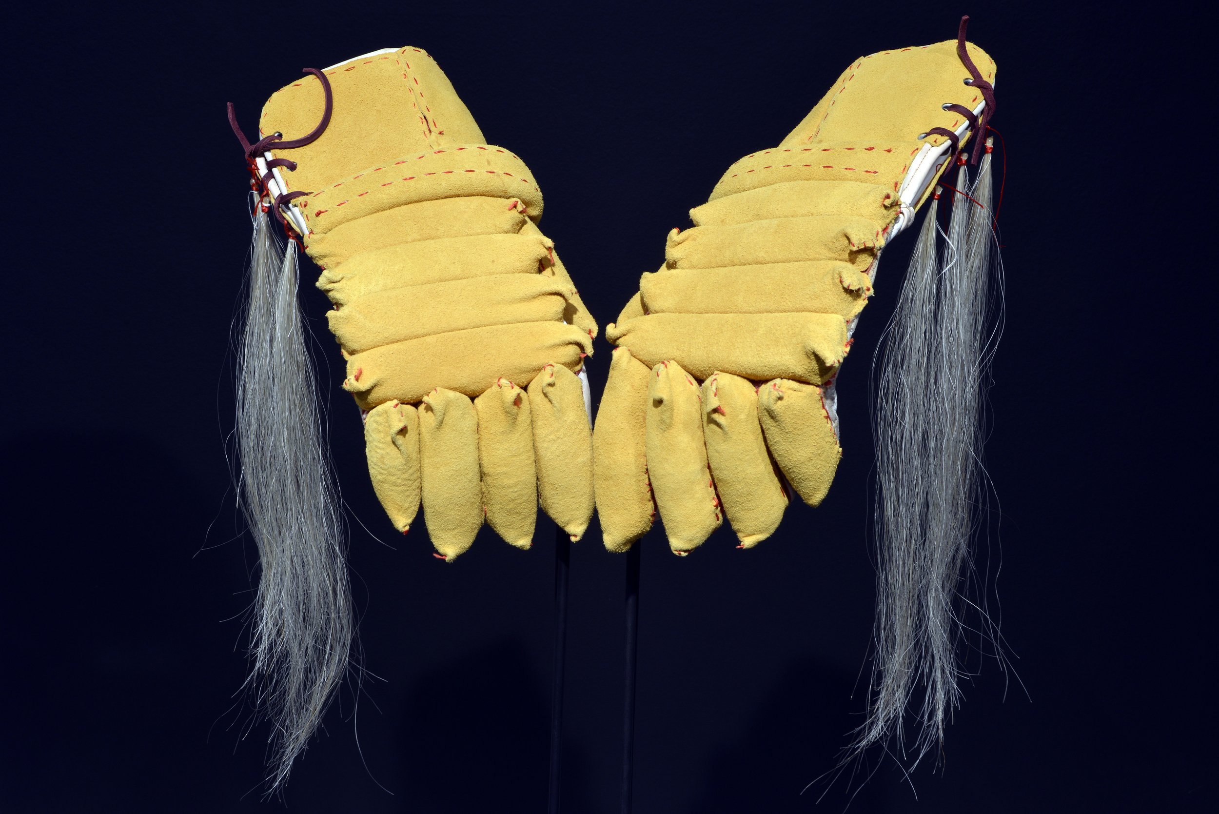 Kevin McKenzie, Untitled (Hockey gloves), tanned deer hide, sinew, gloves, 2021 .