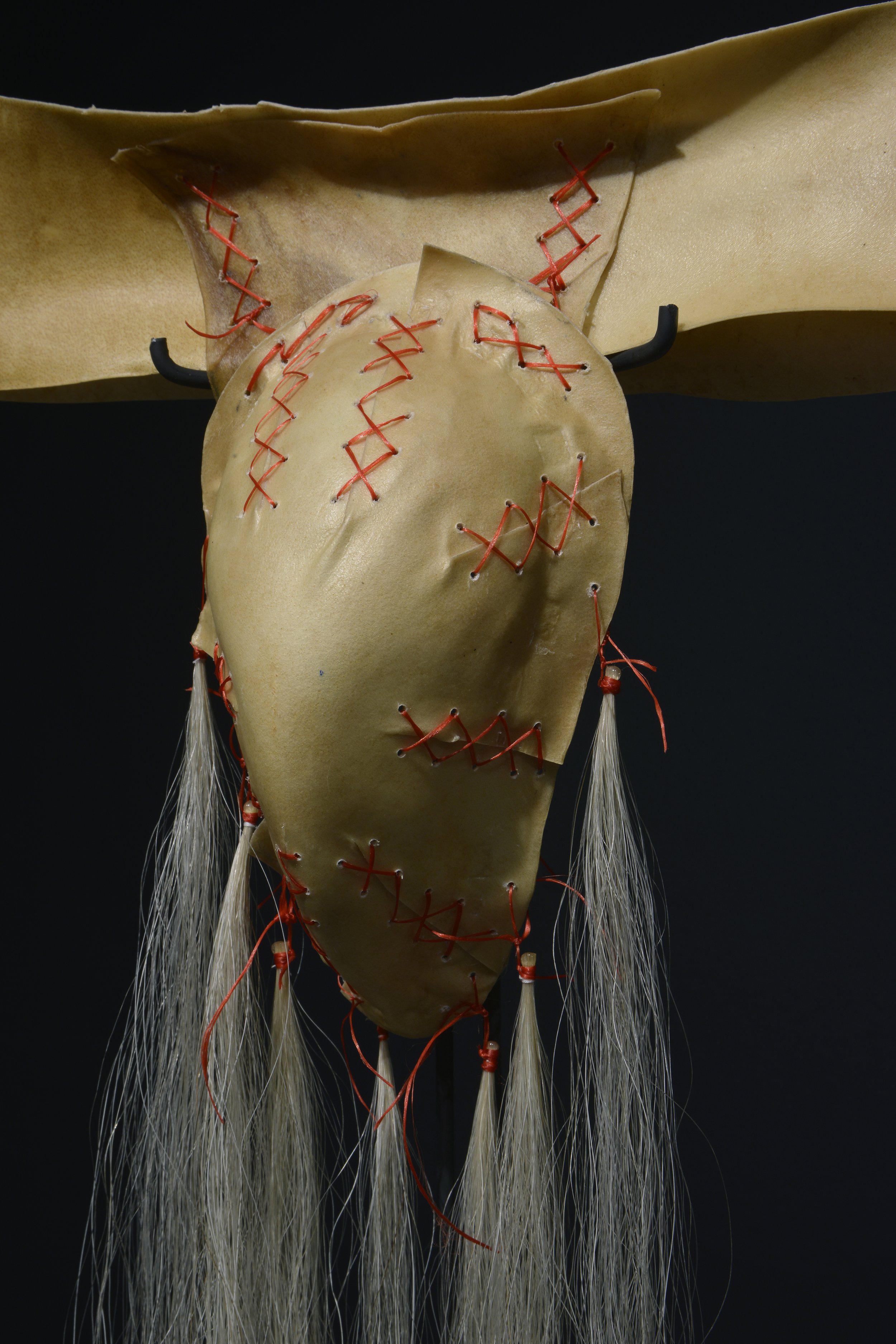 Kevin McKenzie, Untitled (Hockey protective cup), detail, elk rawhide, sinew, horsehair, 2021 .