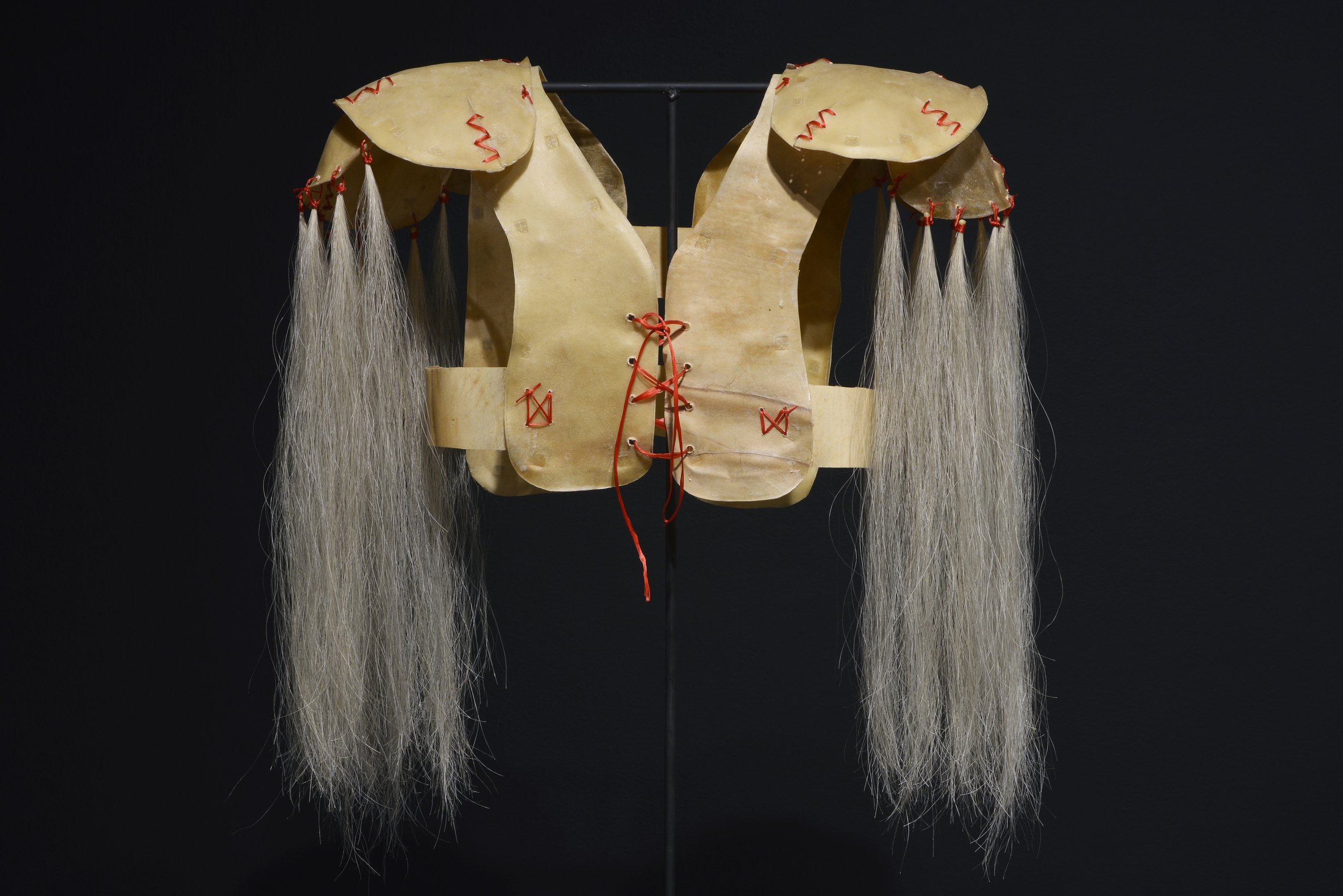 Kevin McKenzie, Untitled (Hockey shoulder pad), elk rawhide, sinew, horsehair, 2020 .