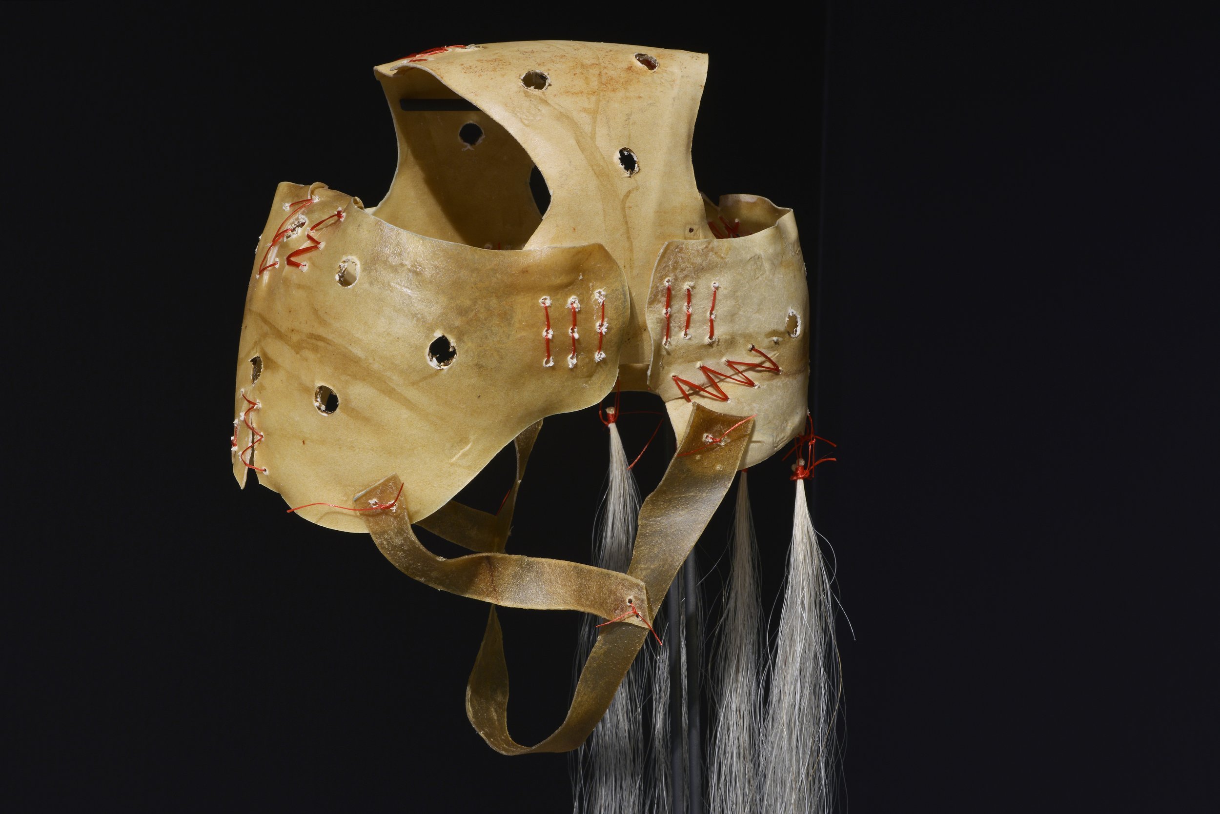 Kevin McKenzie, Untitled (Hockey helmet), detail, elk rawhide, sinew, horsehair, 2021 .