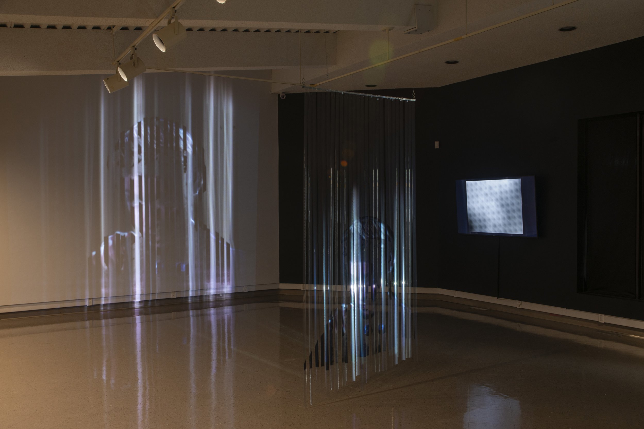   Trapped , 2023, 35 mm film installation and projection. 