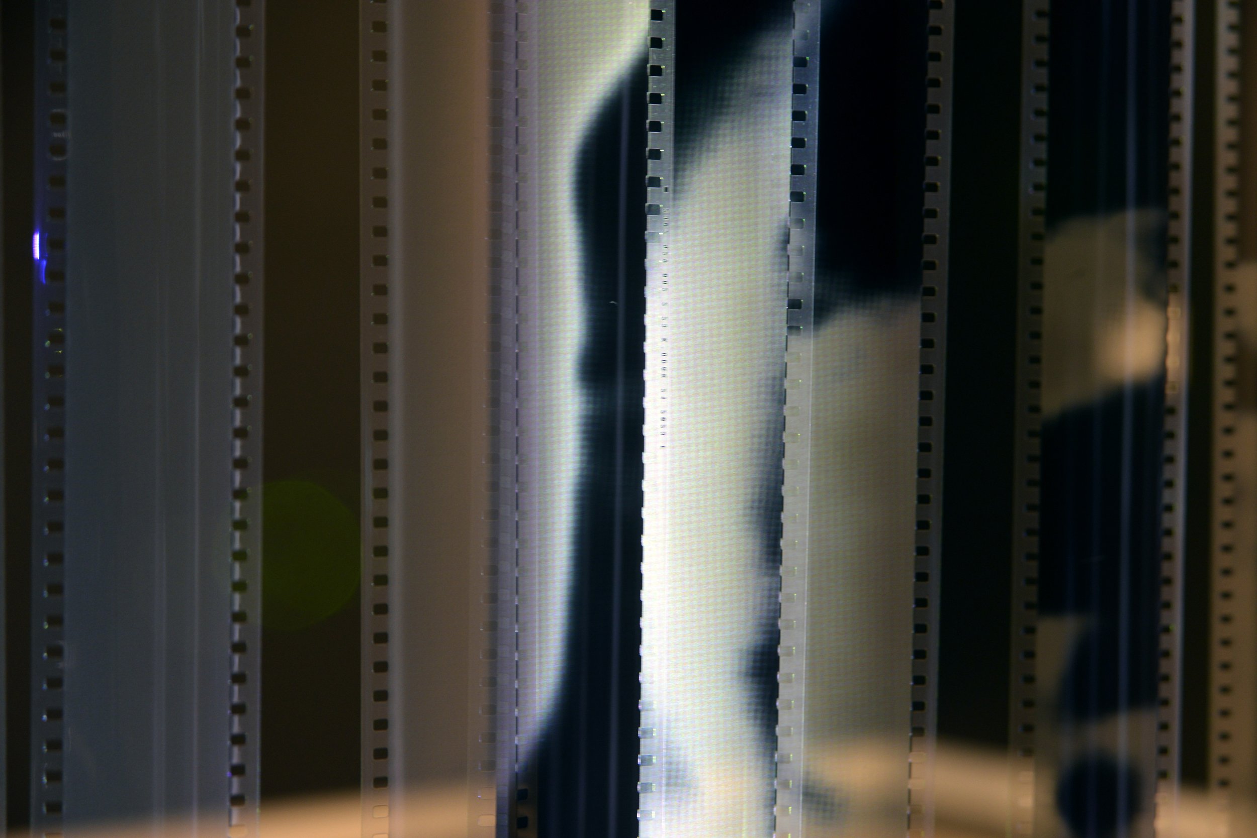   Trapped , detail, 2023, 35 mm film installation and projection. 