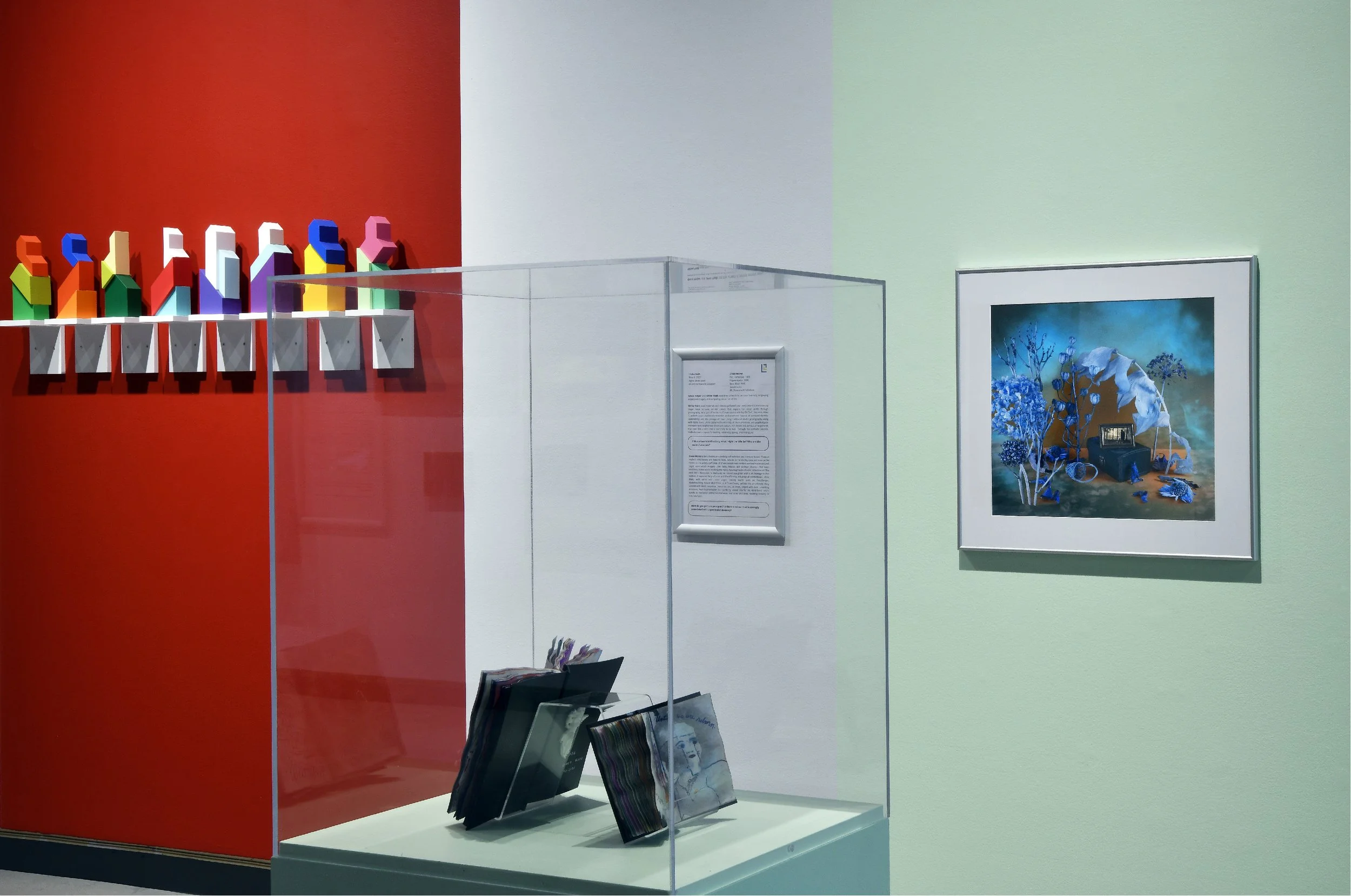  Ronald Kostyniuk,  Prairie Giant A-J Saskatchewan Road Map Series , 2005, spray enamel on MDF. Collection of RPL Permanent Collection. (Left.)  Grace Holyer,  Fragmentation , 1996, sketchbook. Collection of RPL Permanent Collection. (Middle left.)  