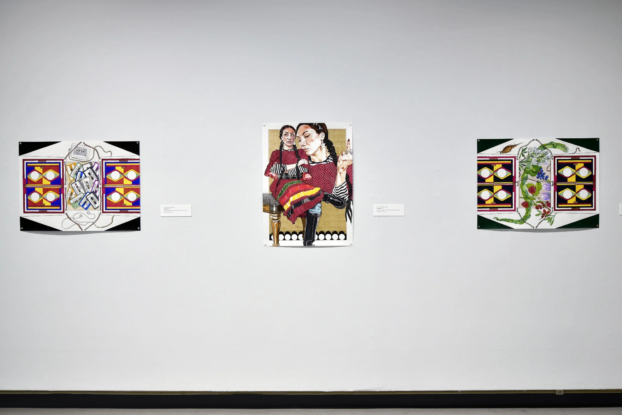  (Left to right)  Bryce Manyfingers/Singer,  parfleche , 2026, mixed media paper, ink, acrylic markers, pencil crayons.  Bryce Manyfingers/Singer,  Steadfast , 2026, mixed media paper, ink, acrylic markers, pencil crayons.  Bryce Manyfingers/Singer, 