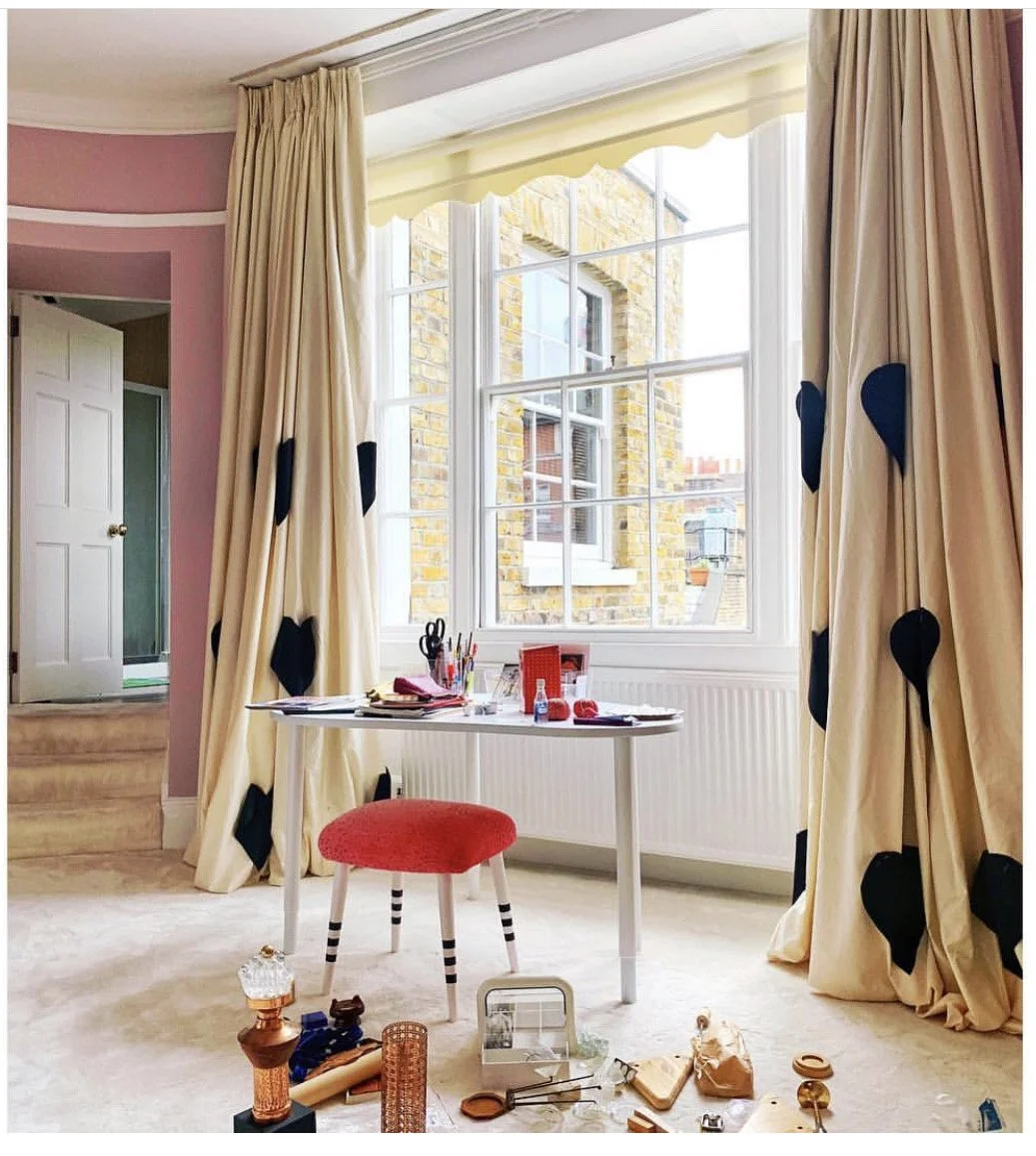 Playful interior by Siru Tuomisto combining vintage furniture, color and Second Chance Art made from repurposed objects.