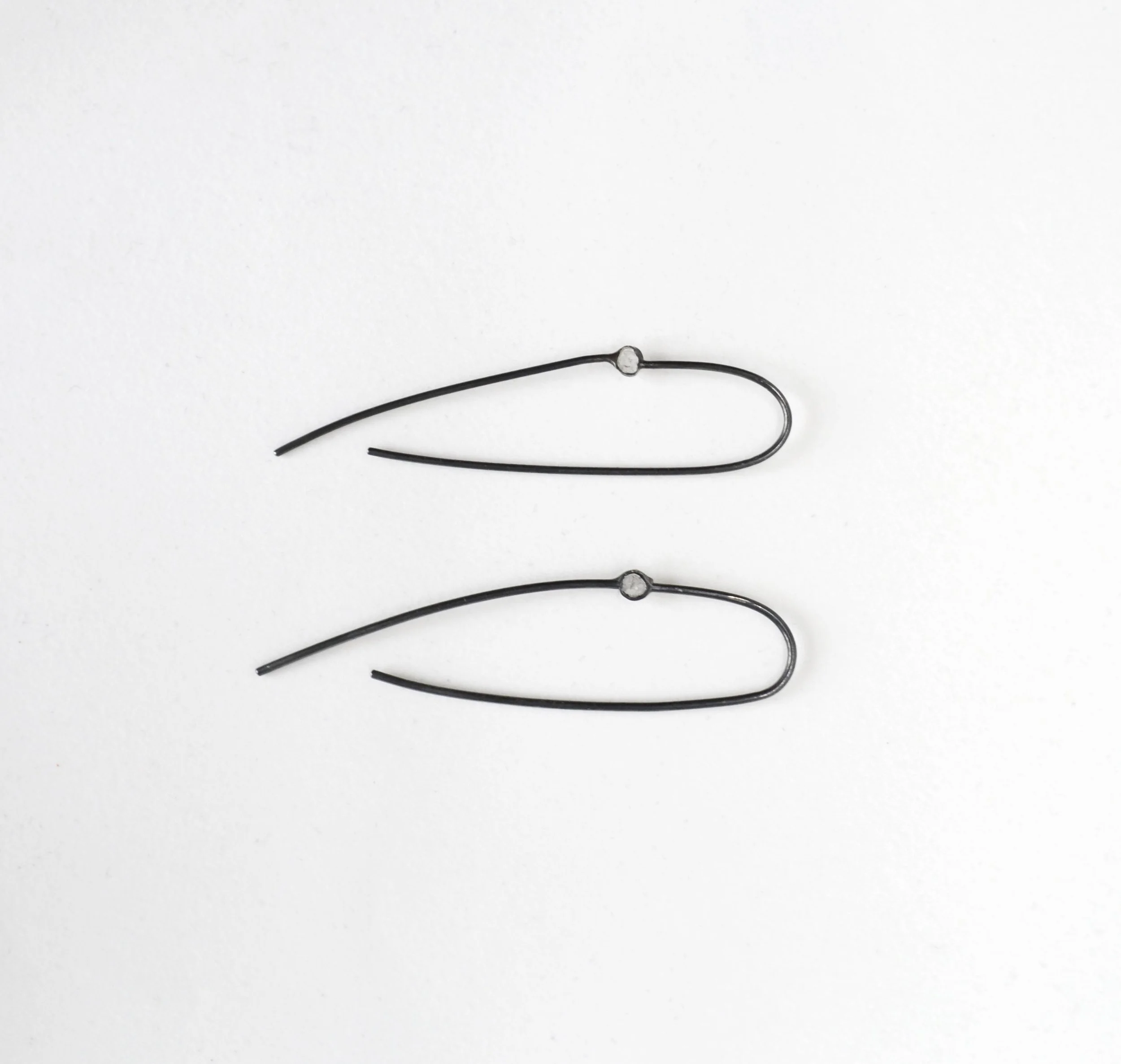 adhiakara.oxilongearring.02.jpg