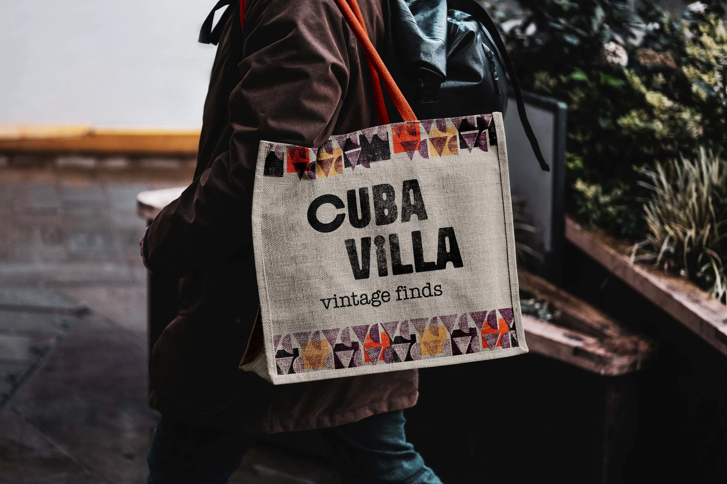 Free Eco Bag Carrying by Man Mockup.jpg