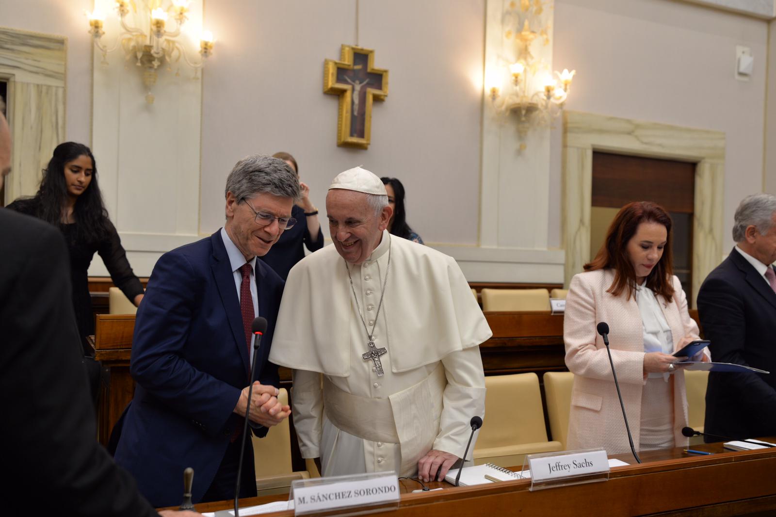 Jeff Sachs (left) and Pope Francis (center) and PGA (right) at the Vatican to discuss SDGs.