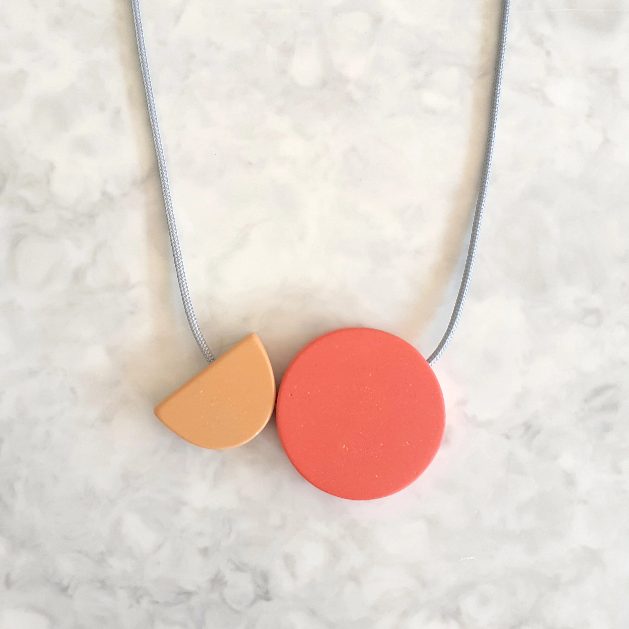 MoonArcPinkYellPendonMarble.jpg