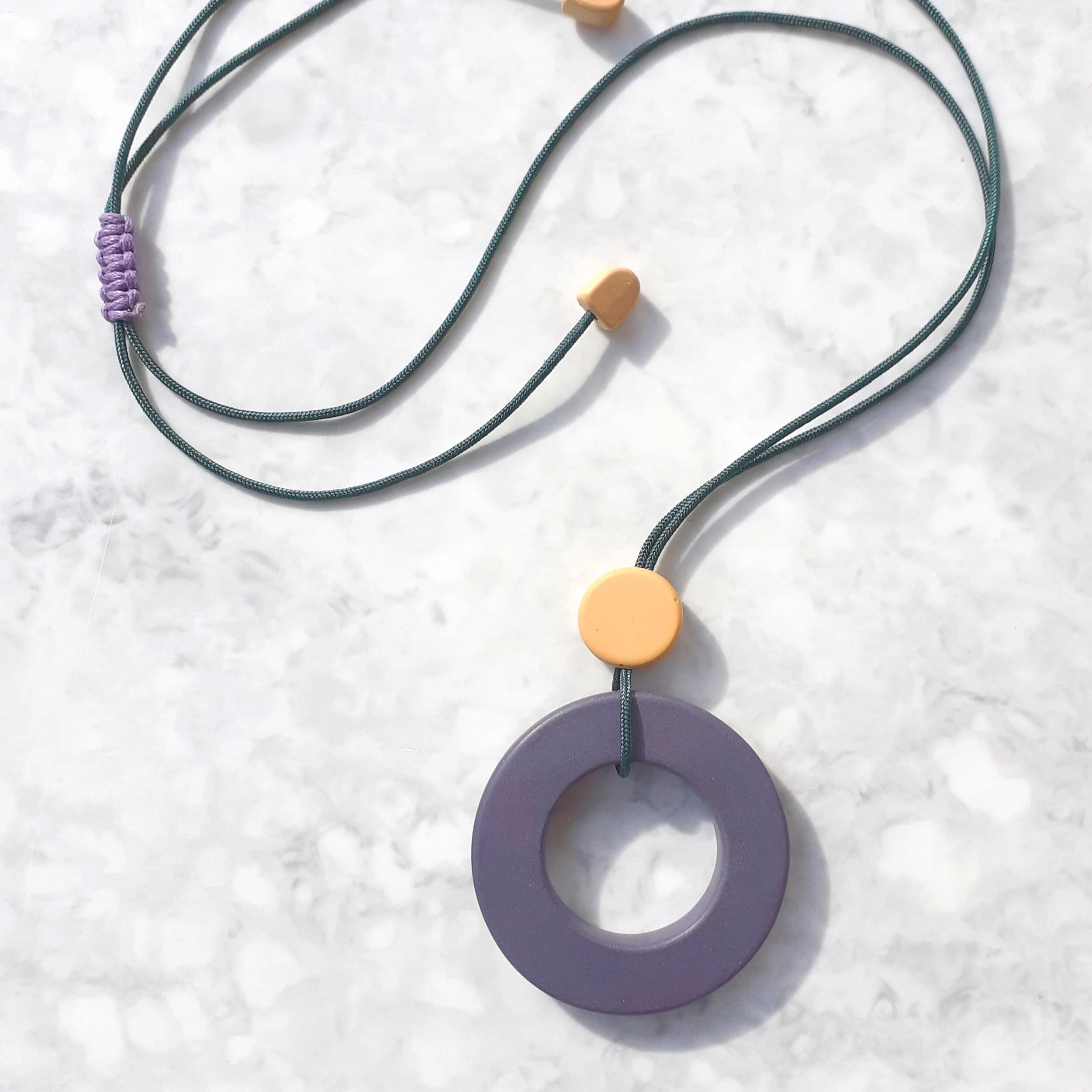 DotHoopPendantPurpleonMarble.jpg