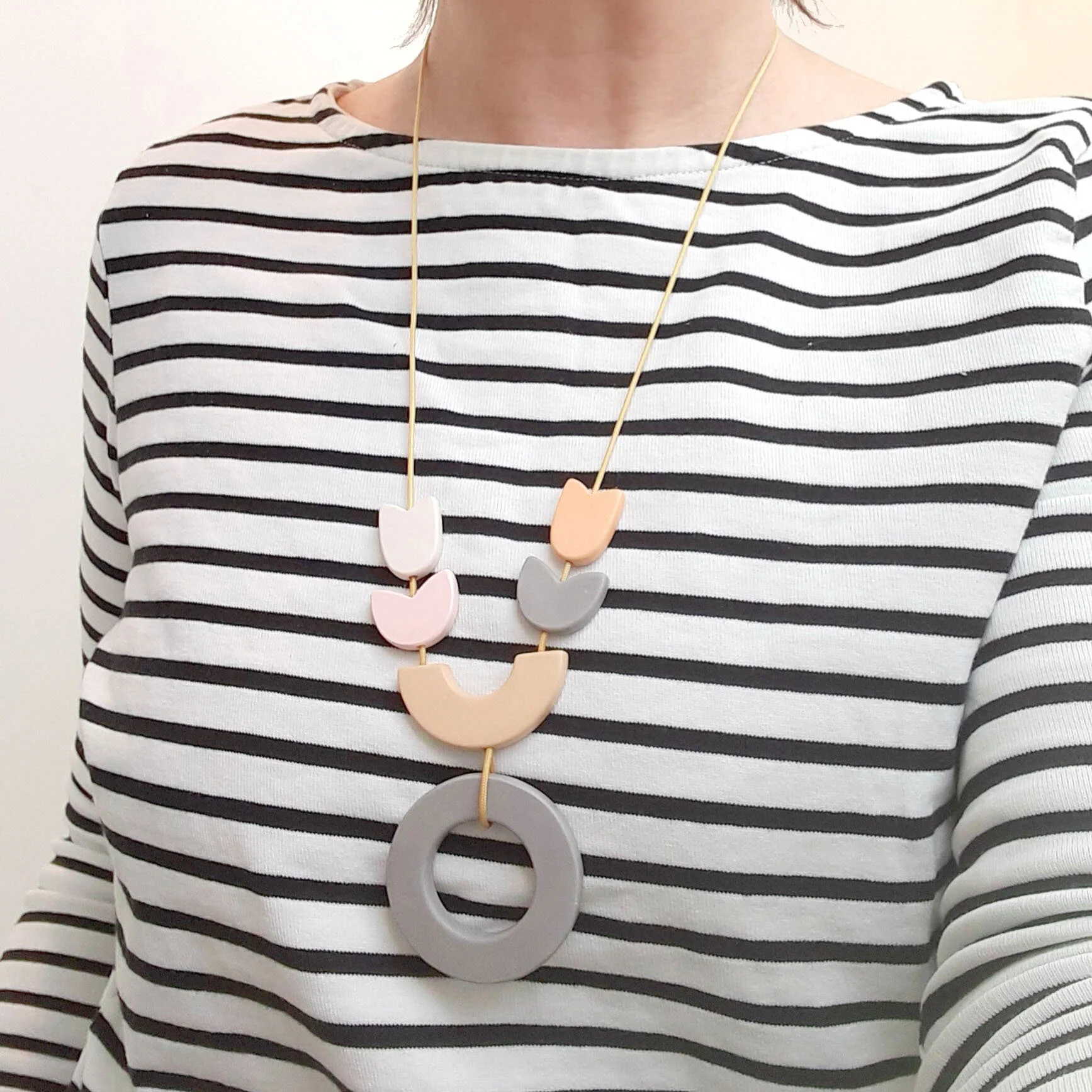 ETSYfloralhoopnecklacepinkyellowwhitegreybeigeWORN.jpg