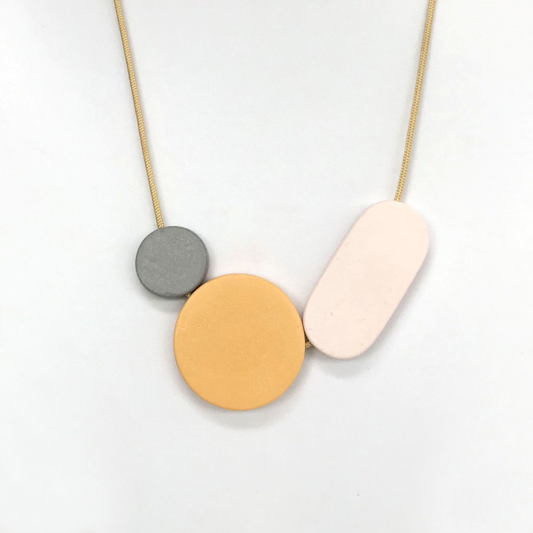 DotMoonOvalNeckGreyYellowPalePinkonYellow.jpg