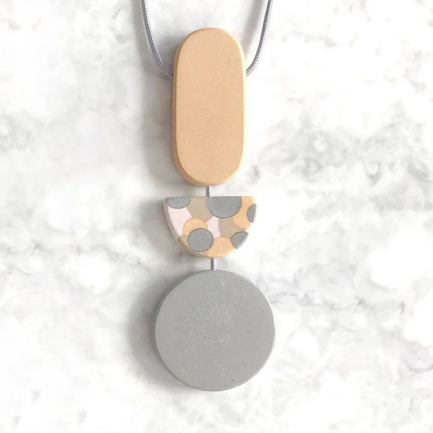 TripleDropYellowSpotPendantonMarble.jpg
