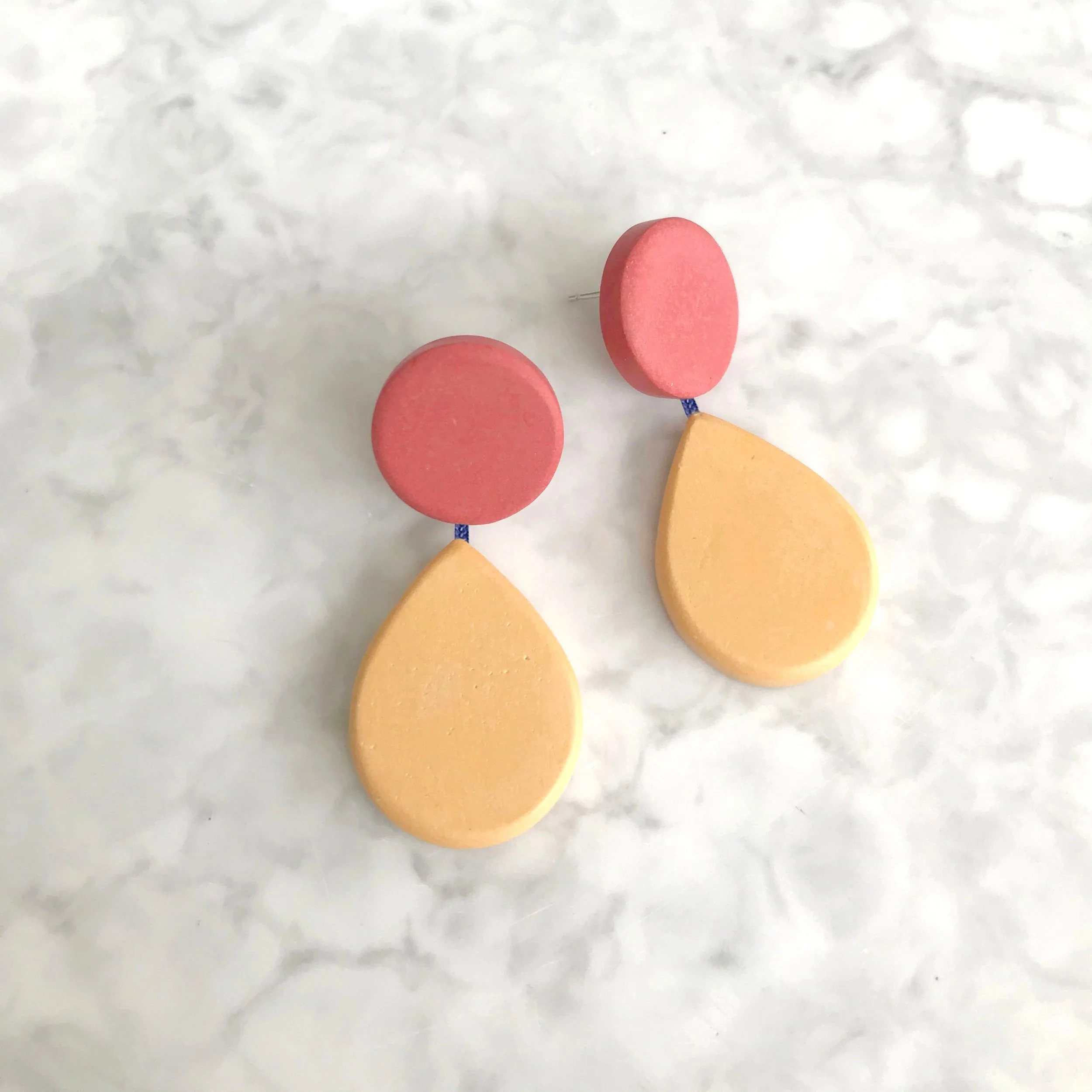 DotDewdropEarringPinYellowonMarble.jpg