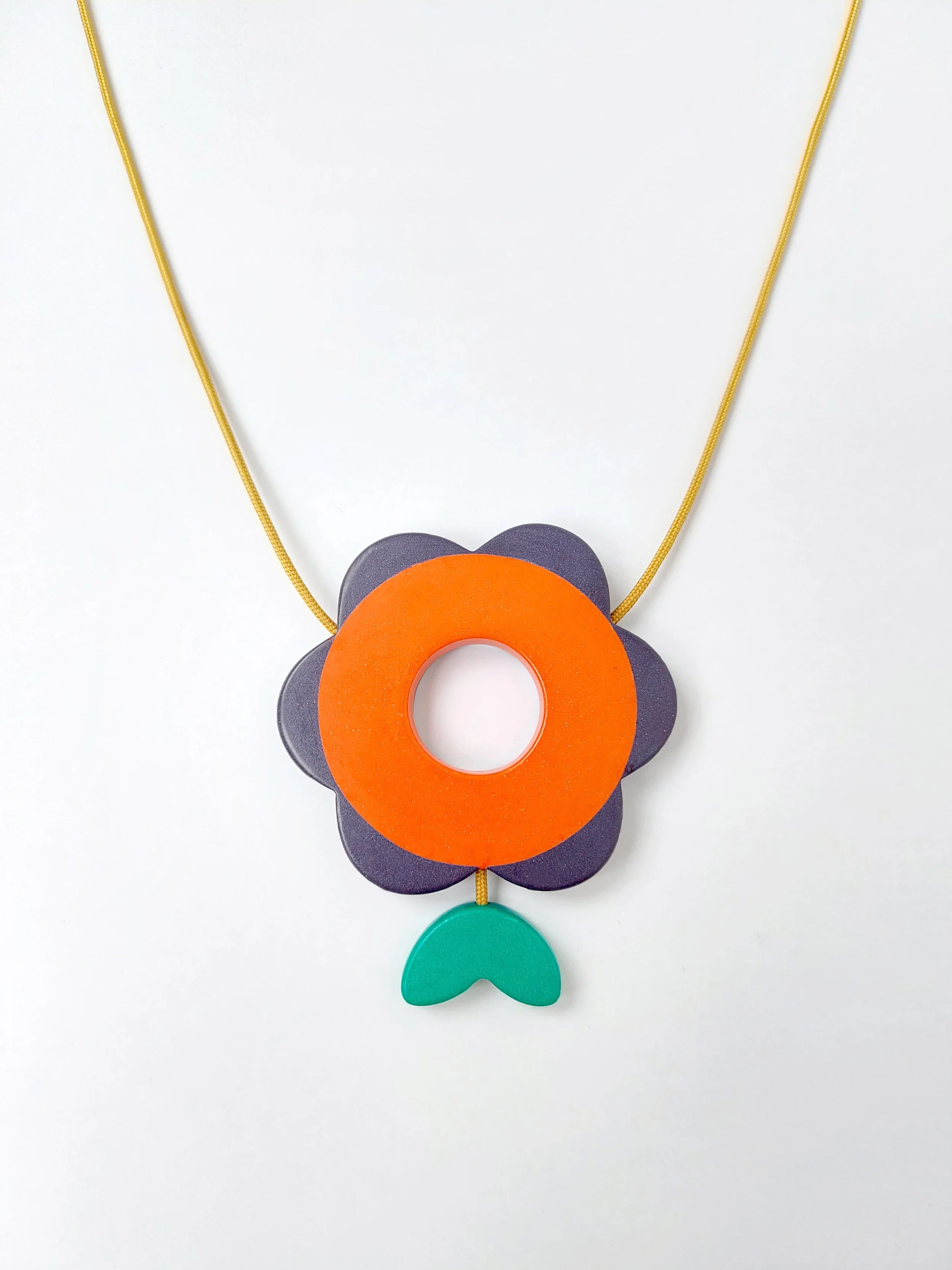 FlowerPowerPendOrangePurpleFront.jpg