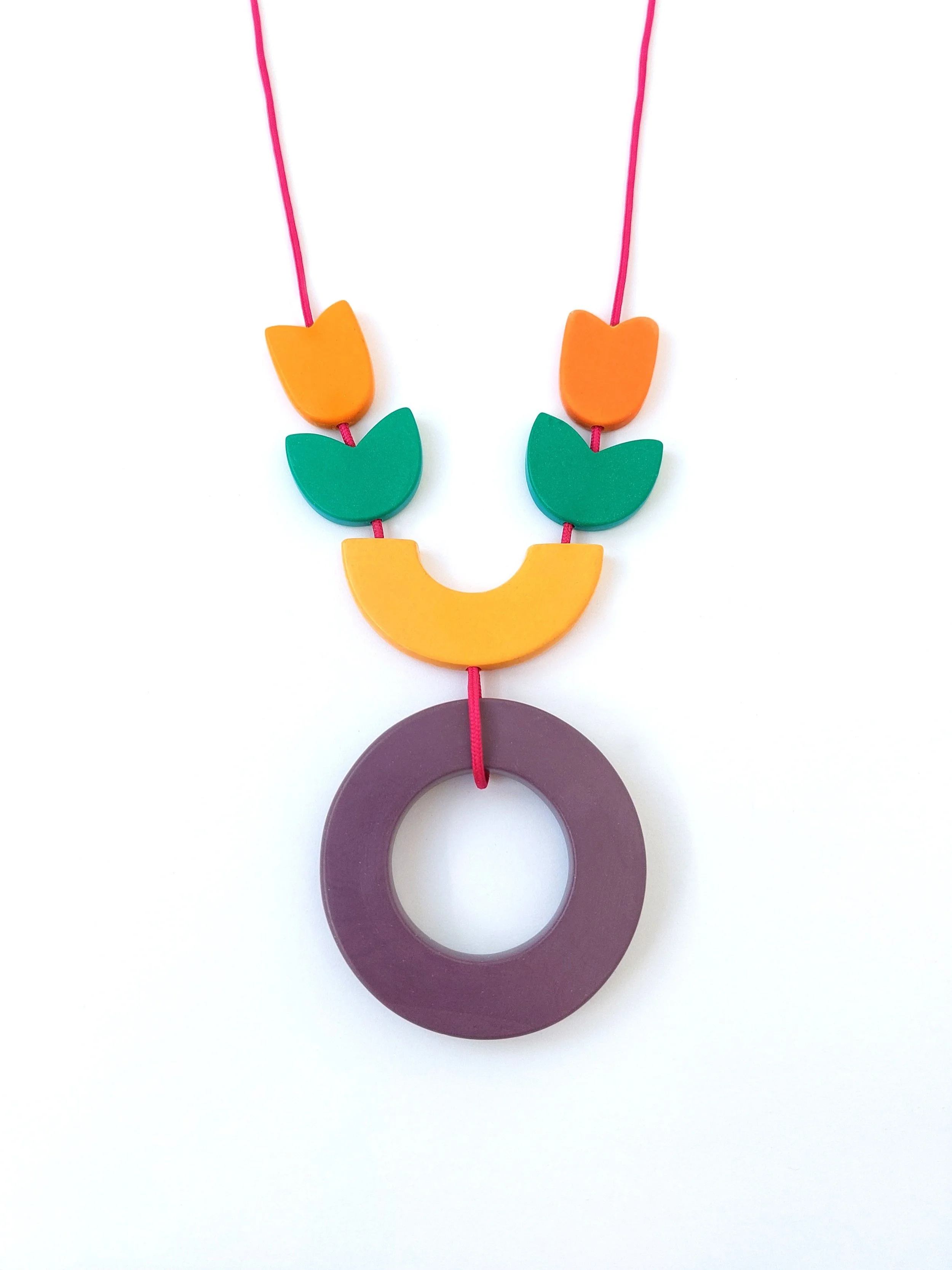 FloralNeckpiecePurpleGreenOrangeYellowPinkFront.jpg