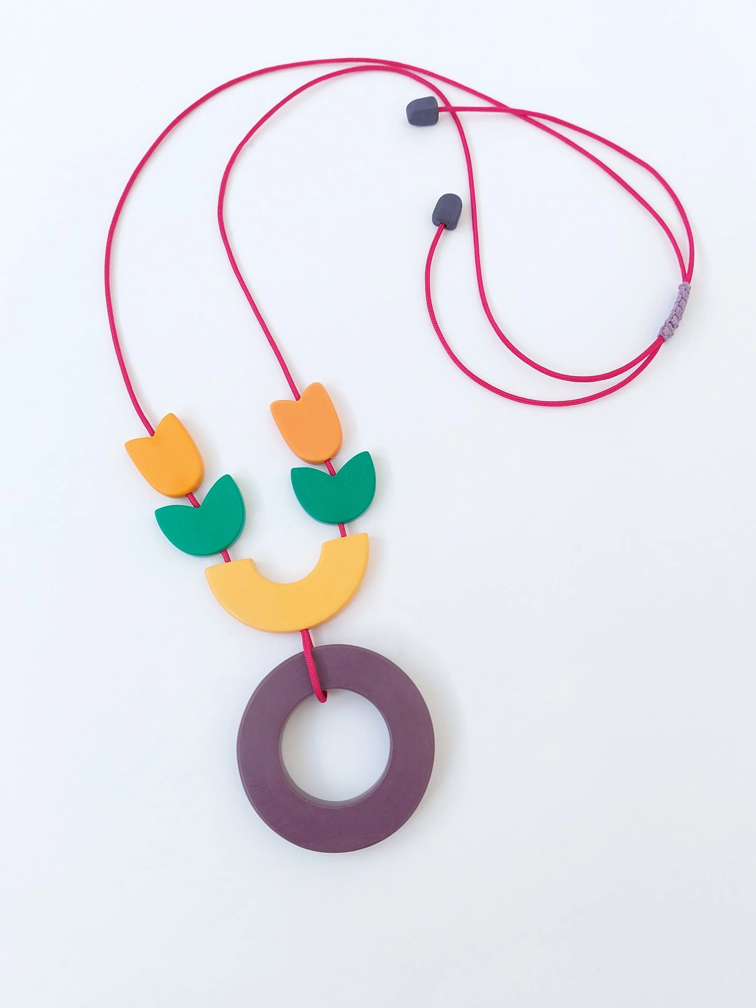FloralNeckpiecePurpleGreenOrangeYellowPinkFullView.jpg