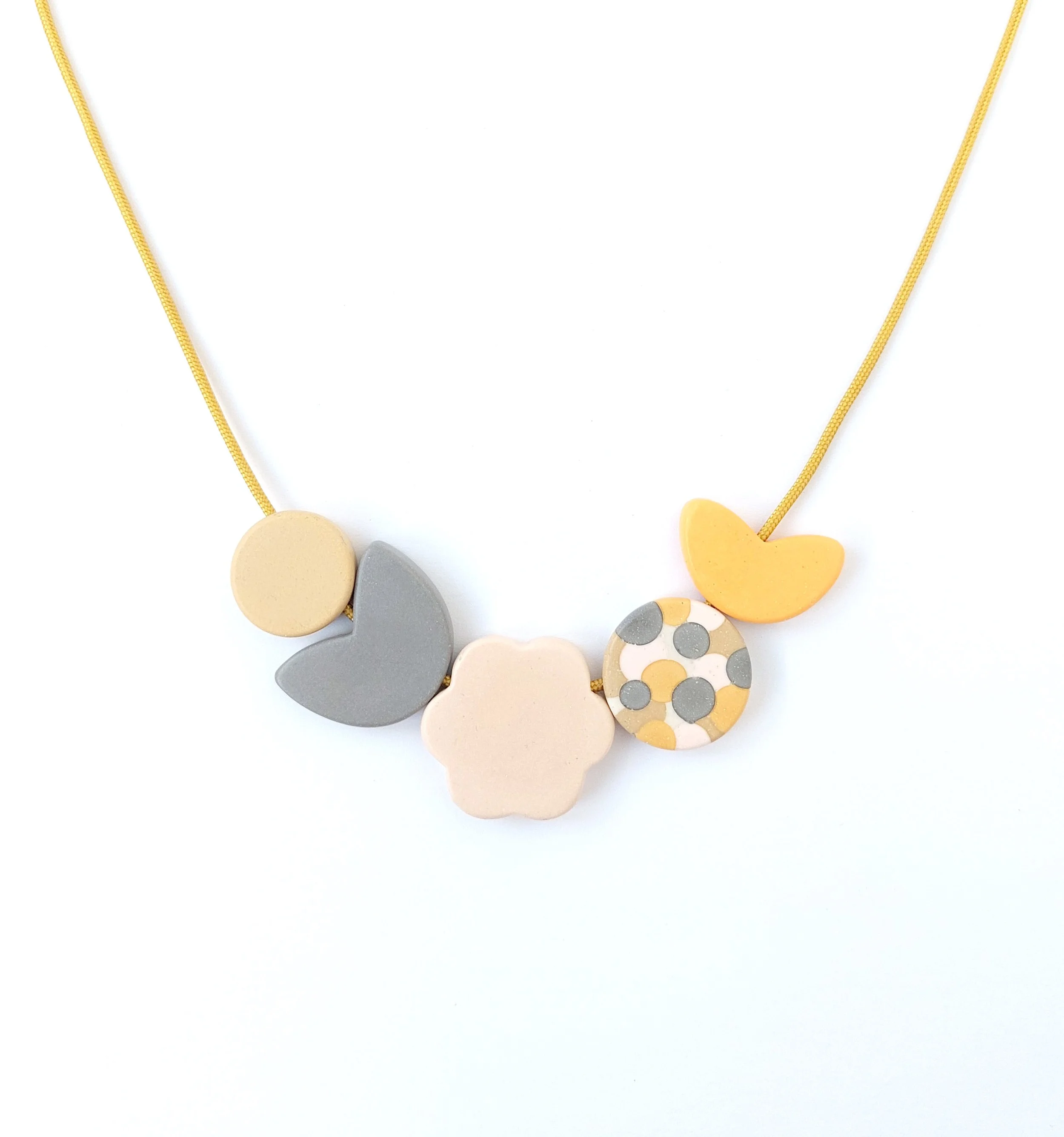 DotsFlowersNecklaceYellowSpotCircleFront.jpg