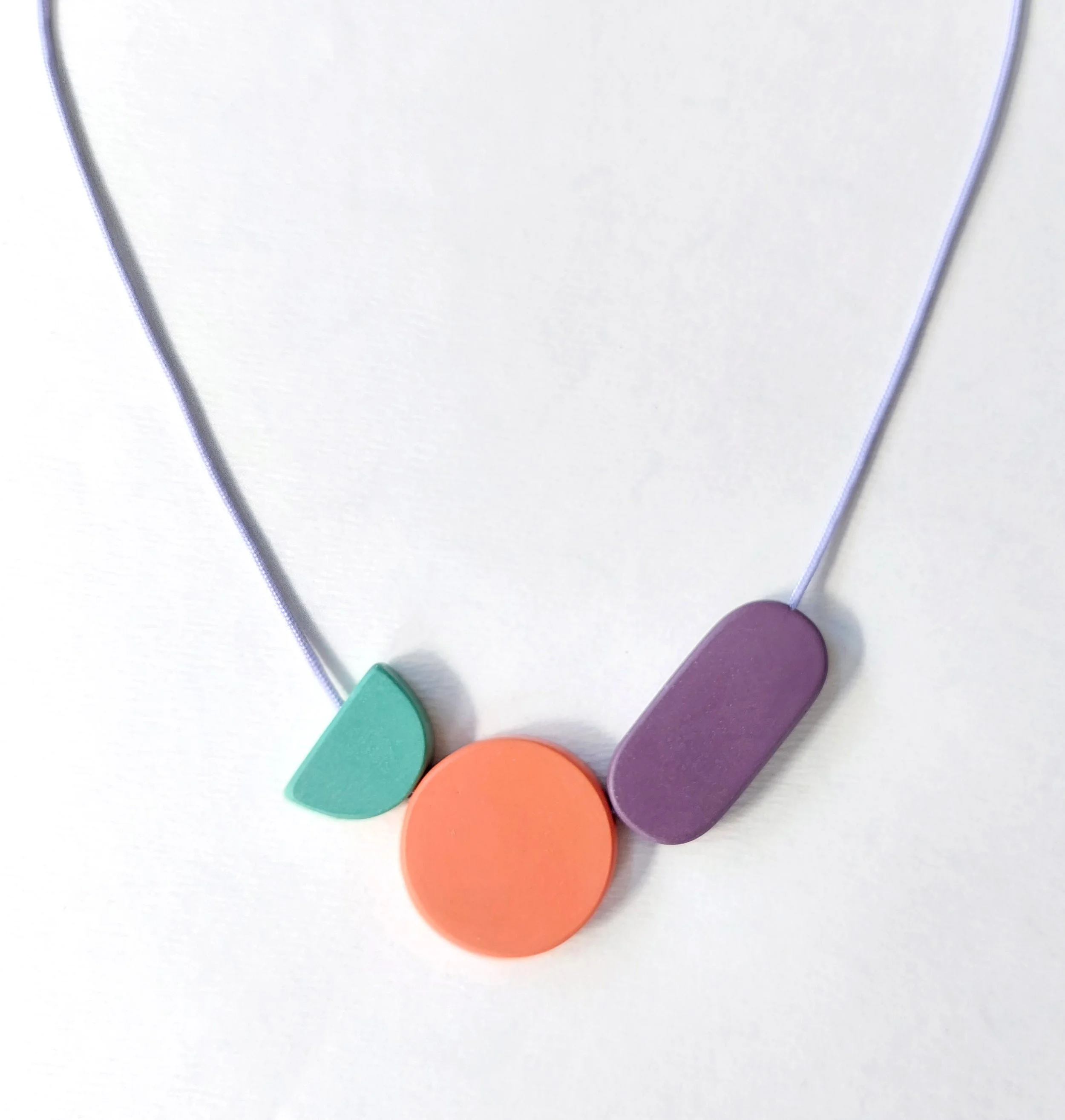 ArchMoonOvalNecklaceTurquoiseOrangePurpleFront.jpg