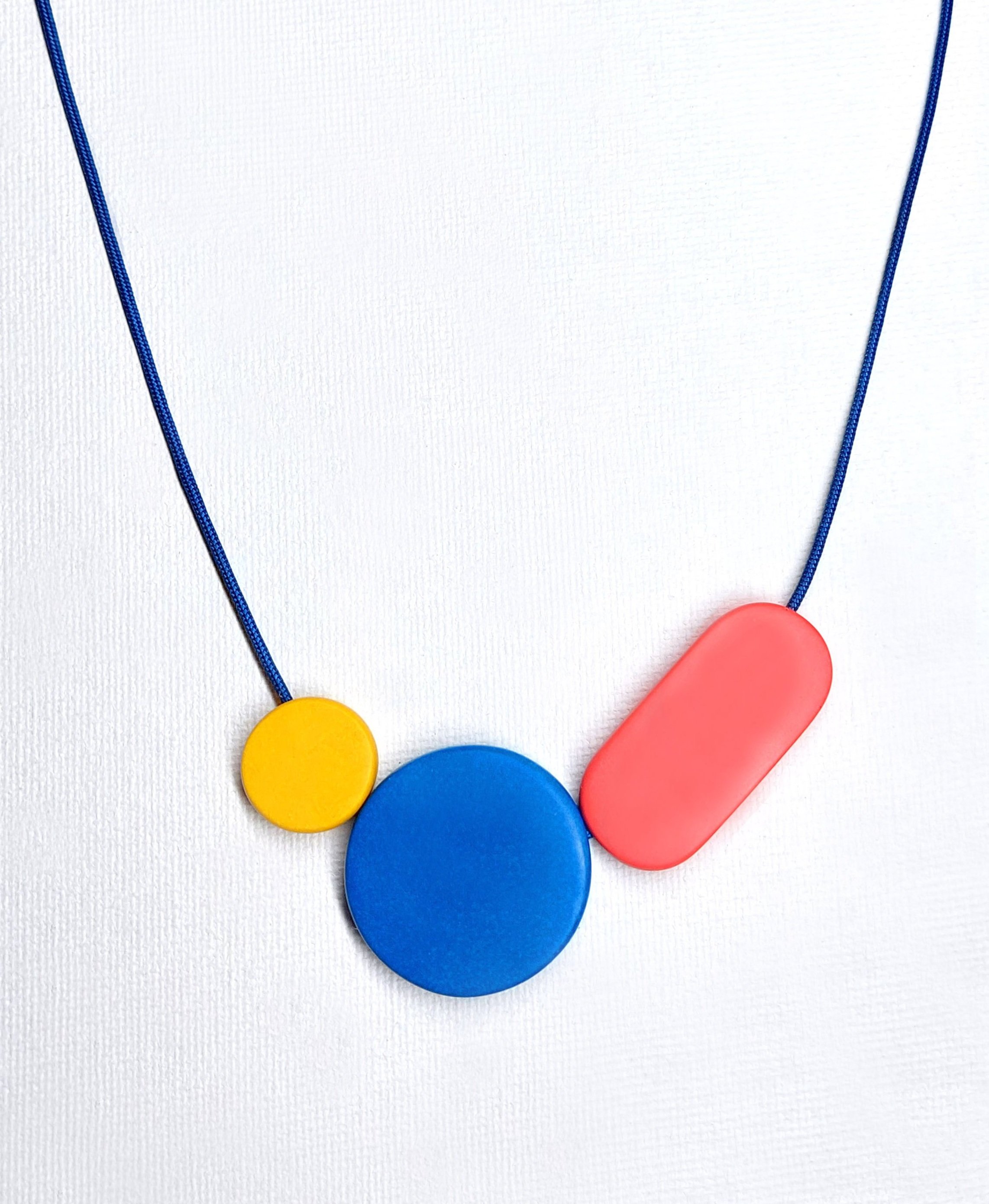 DotMoonOvalNecklaceYellowBluePinkFront.jpg