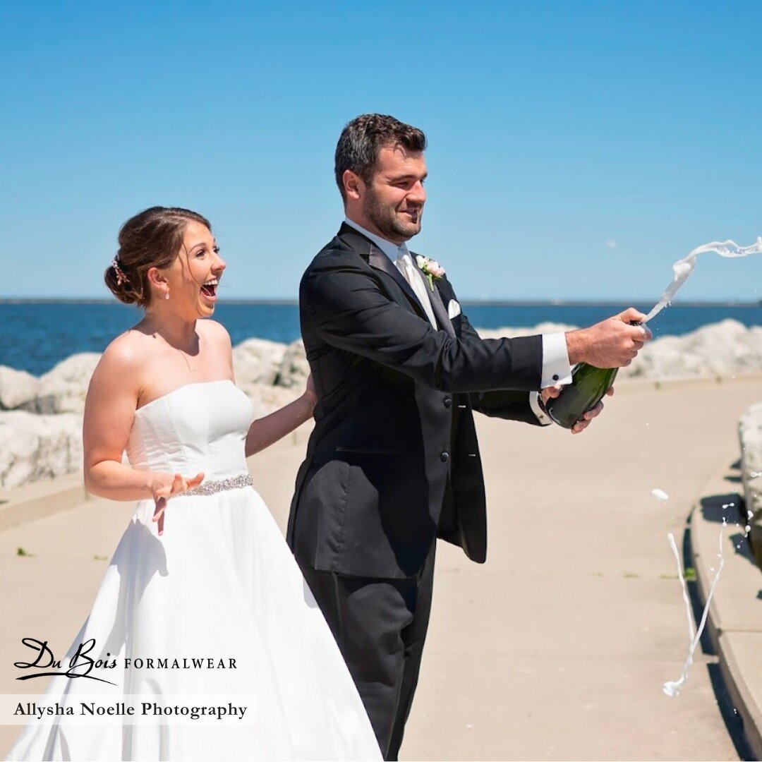 Raising a glass of bubbly to toast these newlyweds against the backdrop of Milwaukee's shoreline! 🍾🥂 Our black tuxedo ensemble exuded sophistication for this wedding - such a classic look! 

Here's to a lifetime of shared dreams and endless adventu