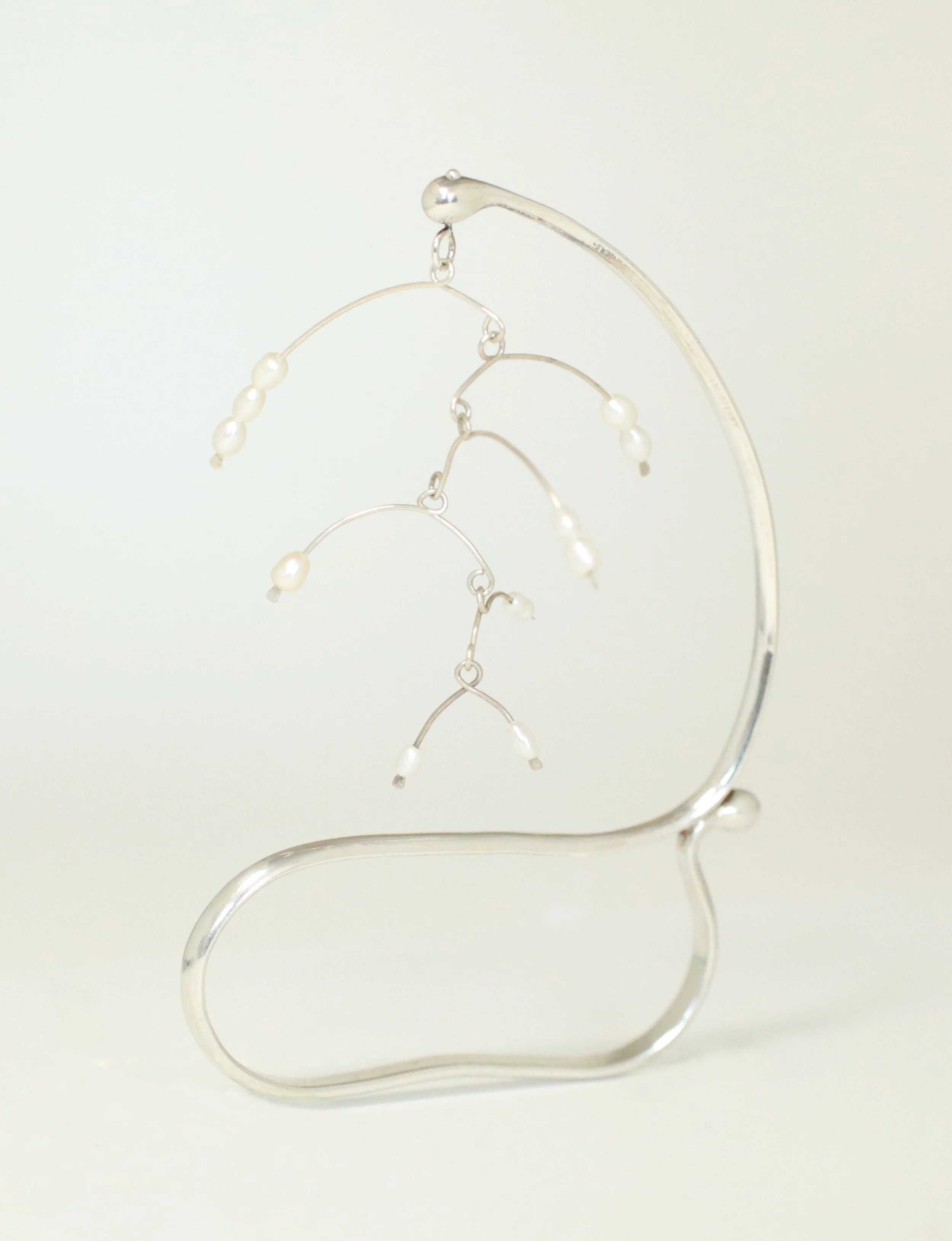Sophie Kissin_Iarge pearl balance ring on white 2.jpeg