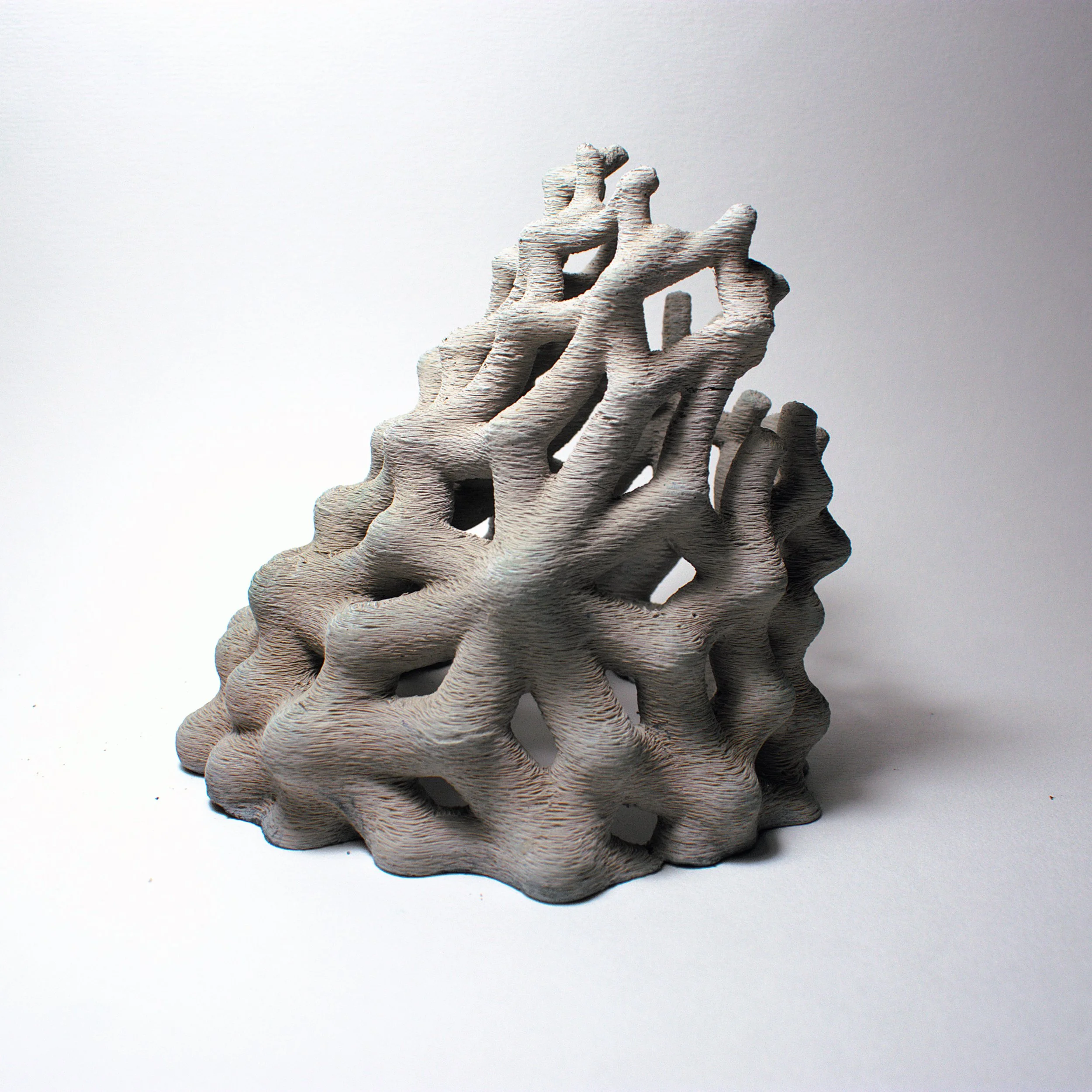 EnchantedMatter_FragmentsOfAFutureMythology1_2025_ConcreteAndEnamel_12x12x12cm_£400.jpg