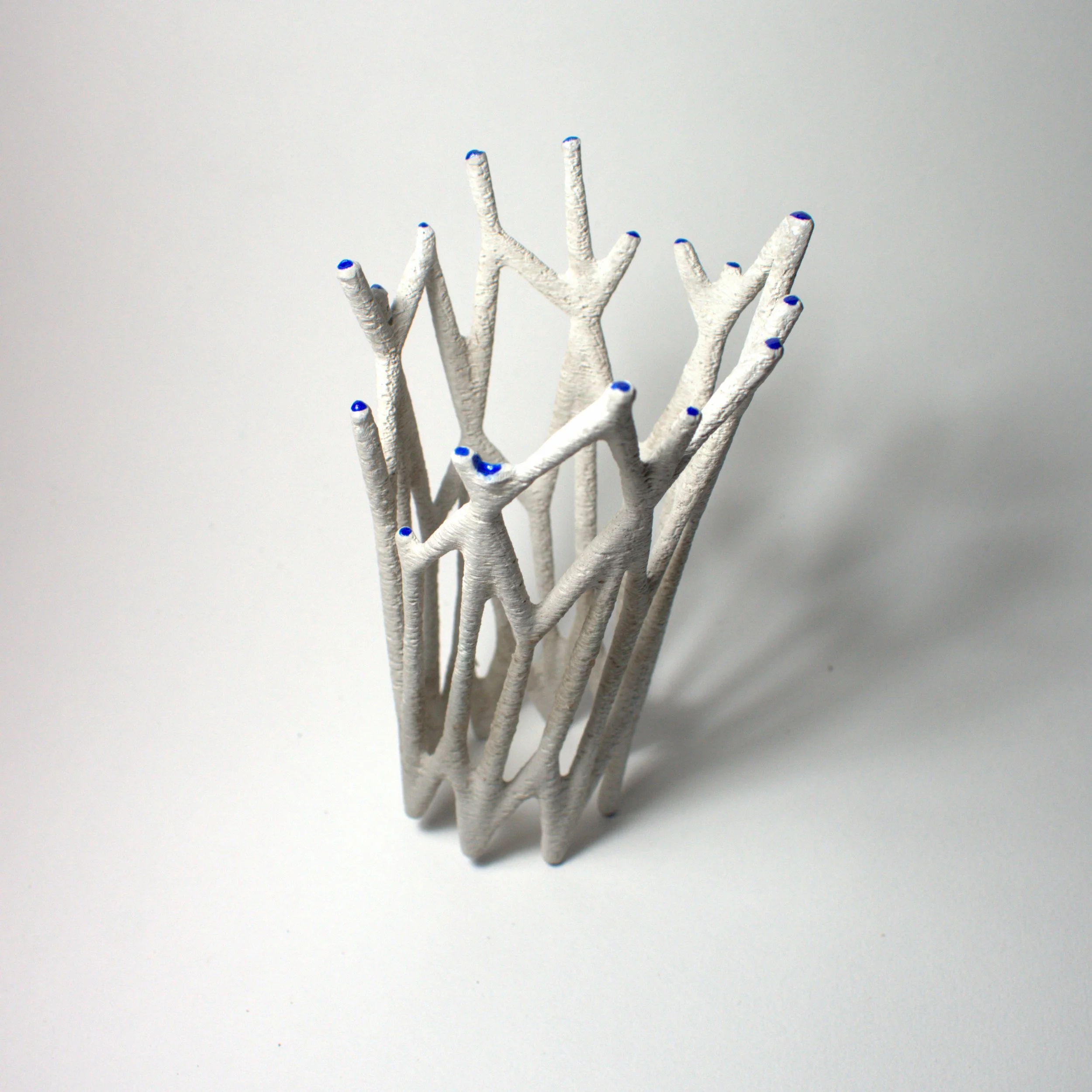 EnchantedMatter_FragmentsOfAFutureMythology4_2025_ConcreteAndEnamel_14x8x8cm_£275.jpg
