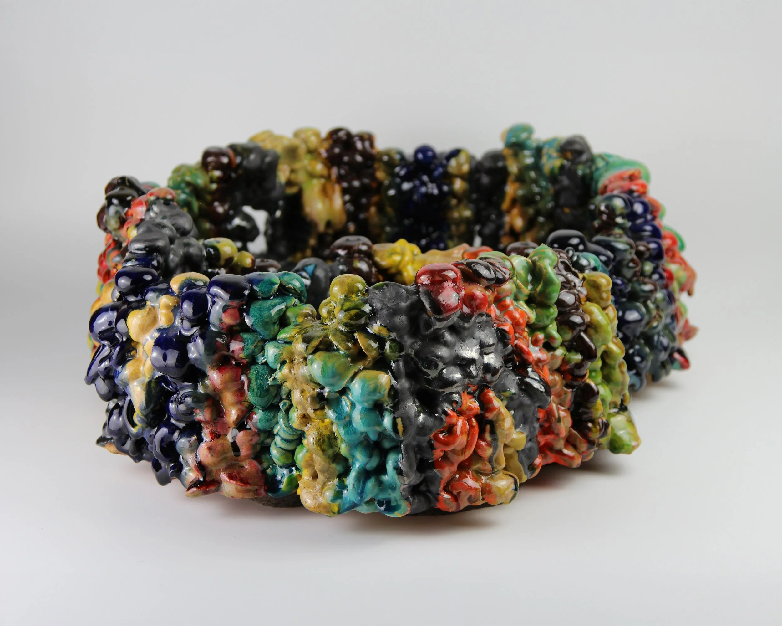 Simpson_VoxelMitosisBasin002_veiwA_2025_StonewareAndPolychromeGlaze_19x70x50_£5000.jpg