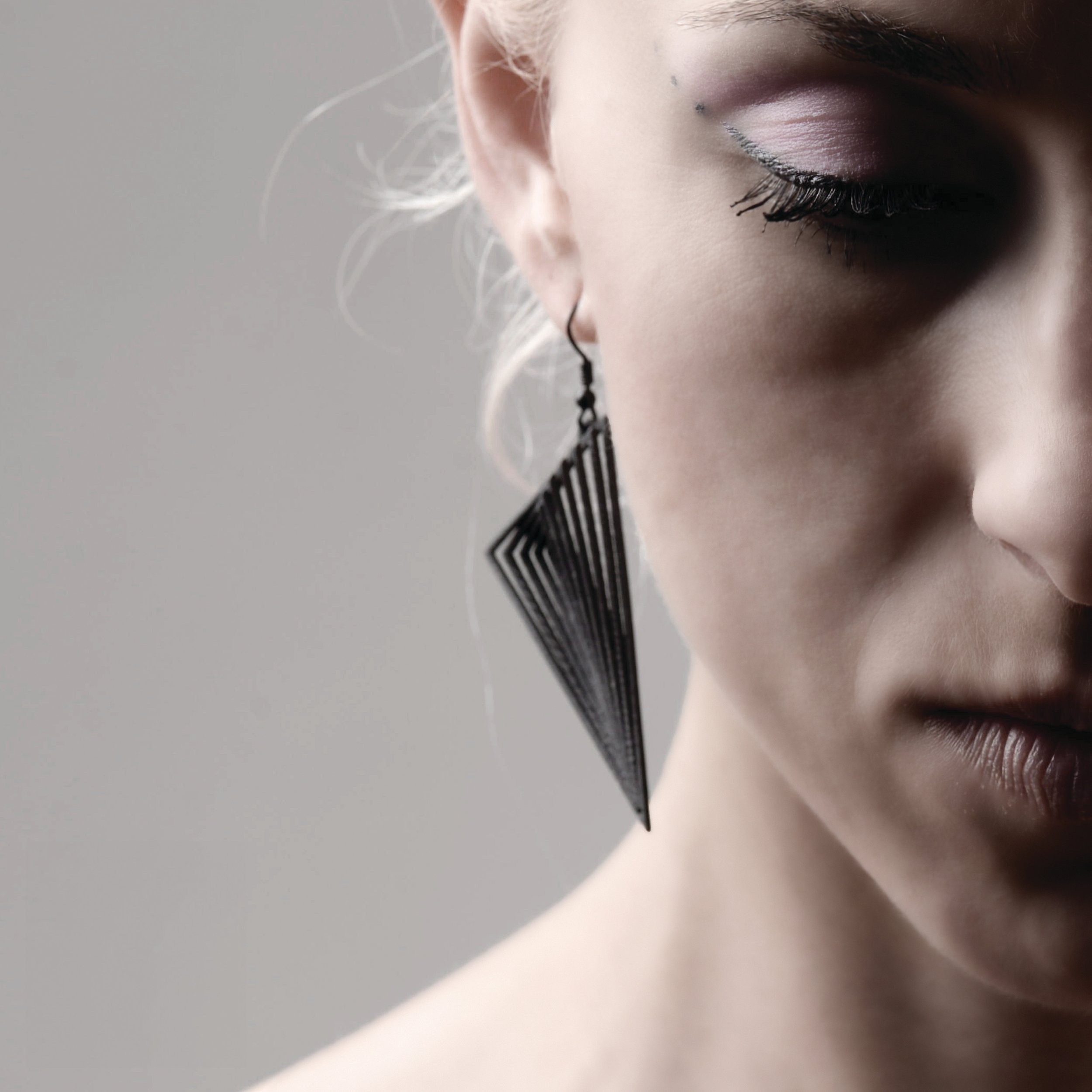 HalaGhatasheh_TriangularEarrings_2025_BlackSteel_5.9x5.9x1cm_£299.jpg
