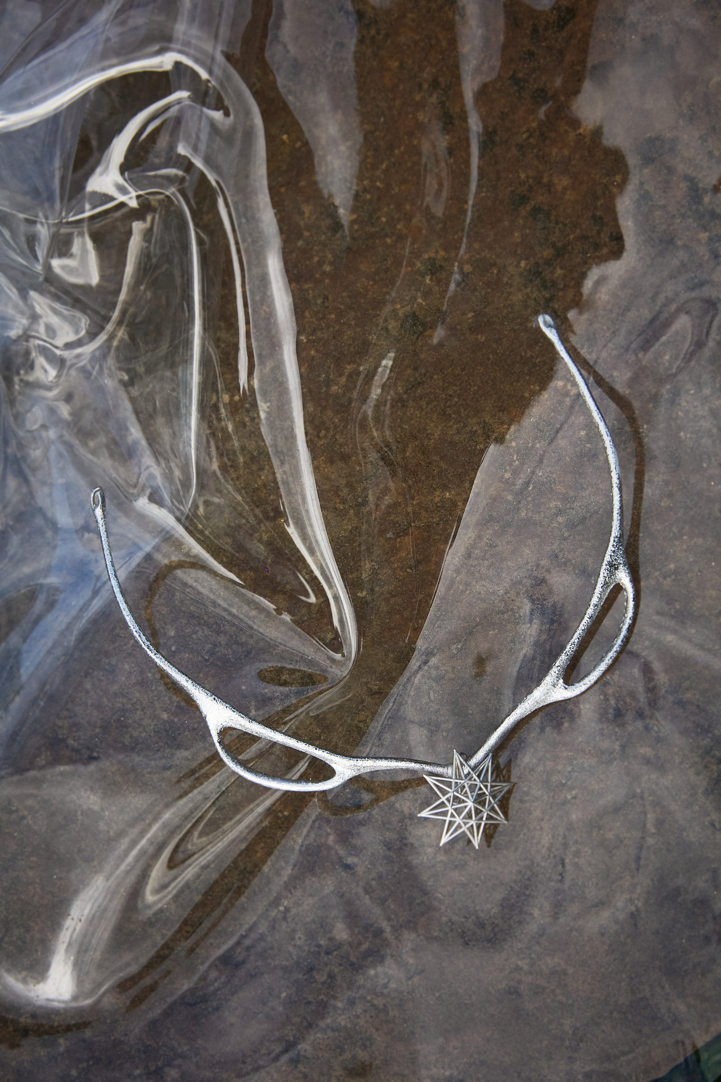 AnastasiaMathiotte_StarCode_2025_SilverMirroirPolish_32.6x32.6x10.9mm_£620_and_AnastasiaMathiotteNataliArefieva_GalacticEyes_2025_StainlessSteelWhiteGoldFinish_159.4x91.3x90.2mm_£1100.jpg