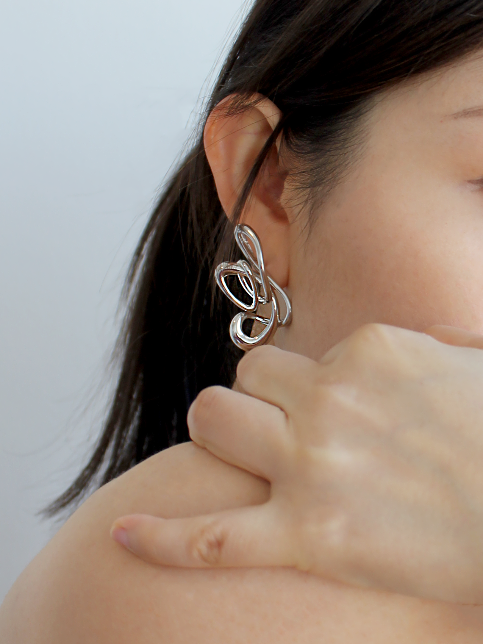 nood_FlickerEarrings_2025_RhodiumPlatedBrass_2.5x5cm_£63.jpg