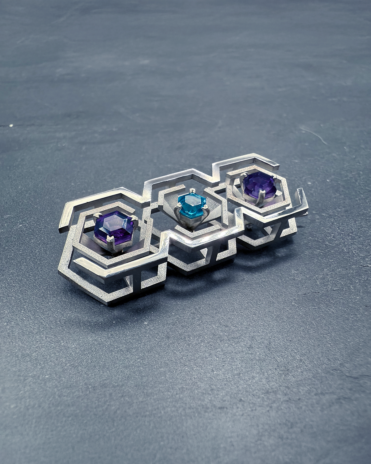 82 X-1 (Brooch).png