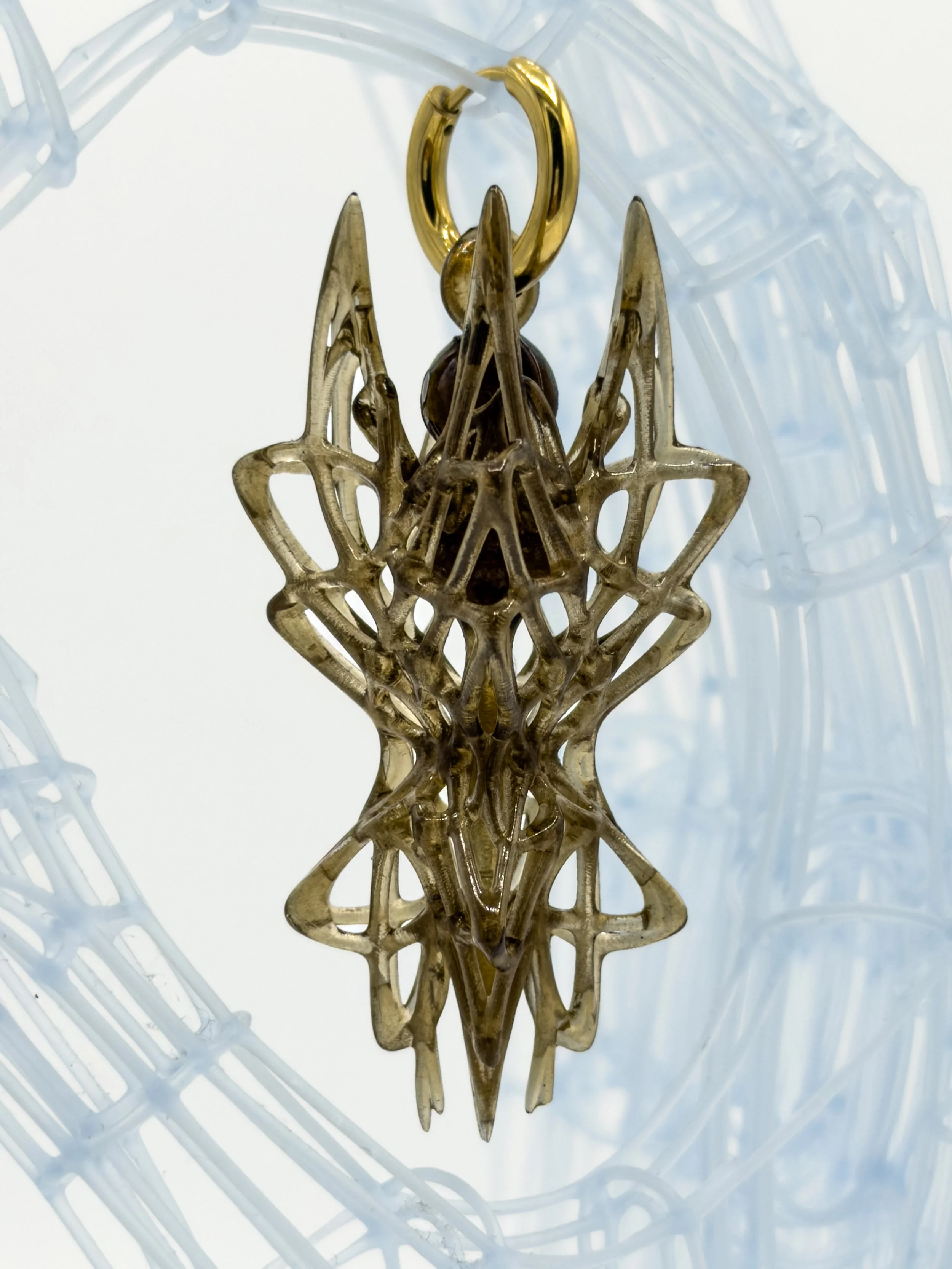 FernandaPovoa_AsterFractalisAcutus_purple1_2024_ PlantBasedResinLacquer18kGoldPlated304StainlessSteelHoops_8x2x2cm_£130(1).jpg