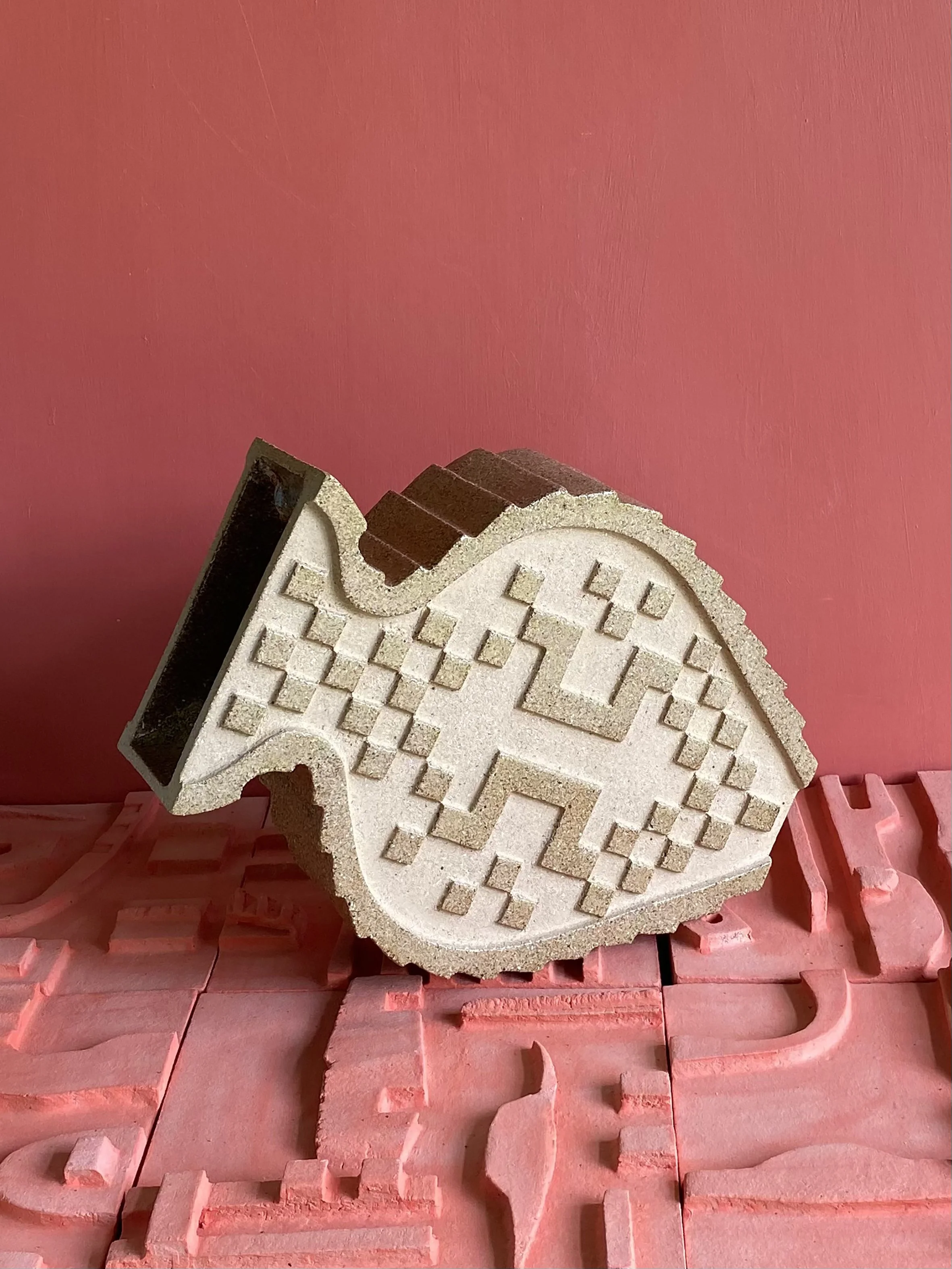 Lisa Lapointe - ceramic vessel on ceramic tiles.jpeg