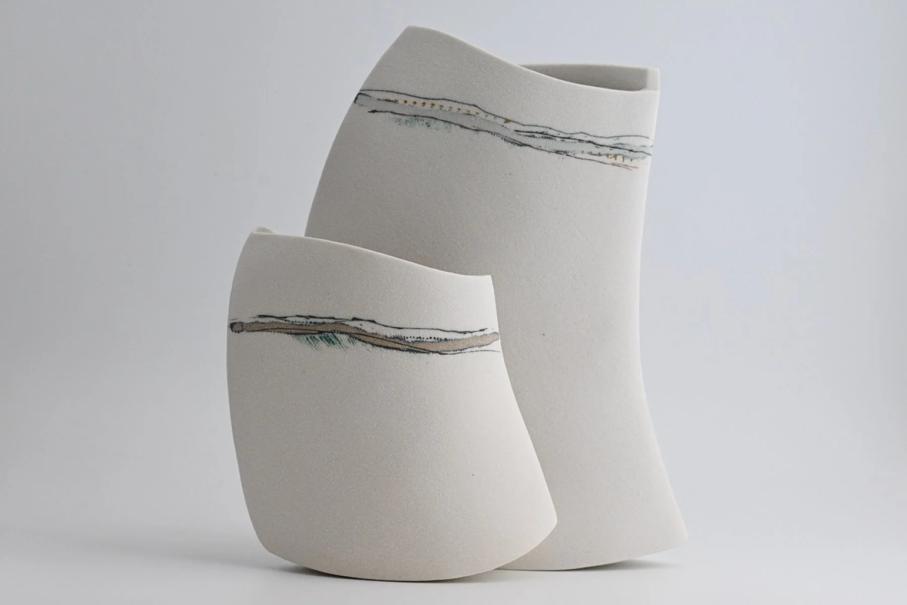 StephanieJohnson_2Landmarkvessels_2025-CeramicPorcelain_a)18x13x4,b)11x11x3_a)350,b)200.jpg