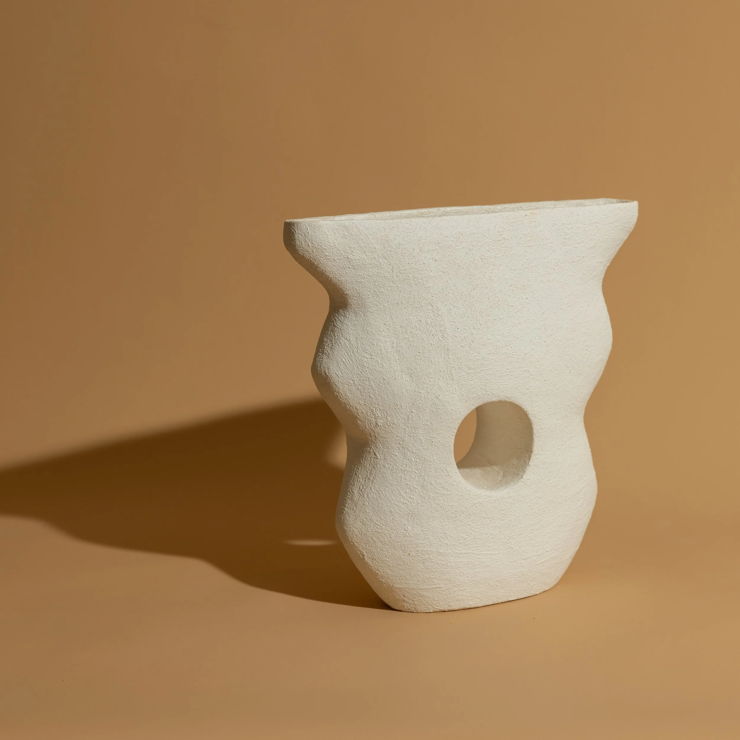 StephaniePhillips_Lunae_2023_texturedEarthenwareVase_30cmx20cmx10cm_£420.jpg