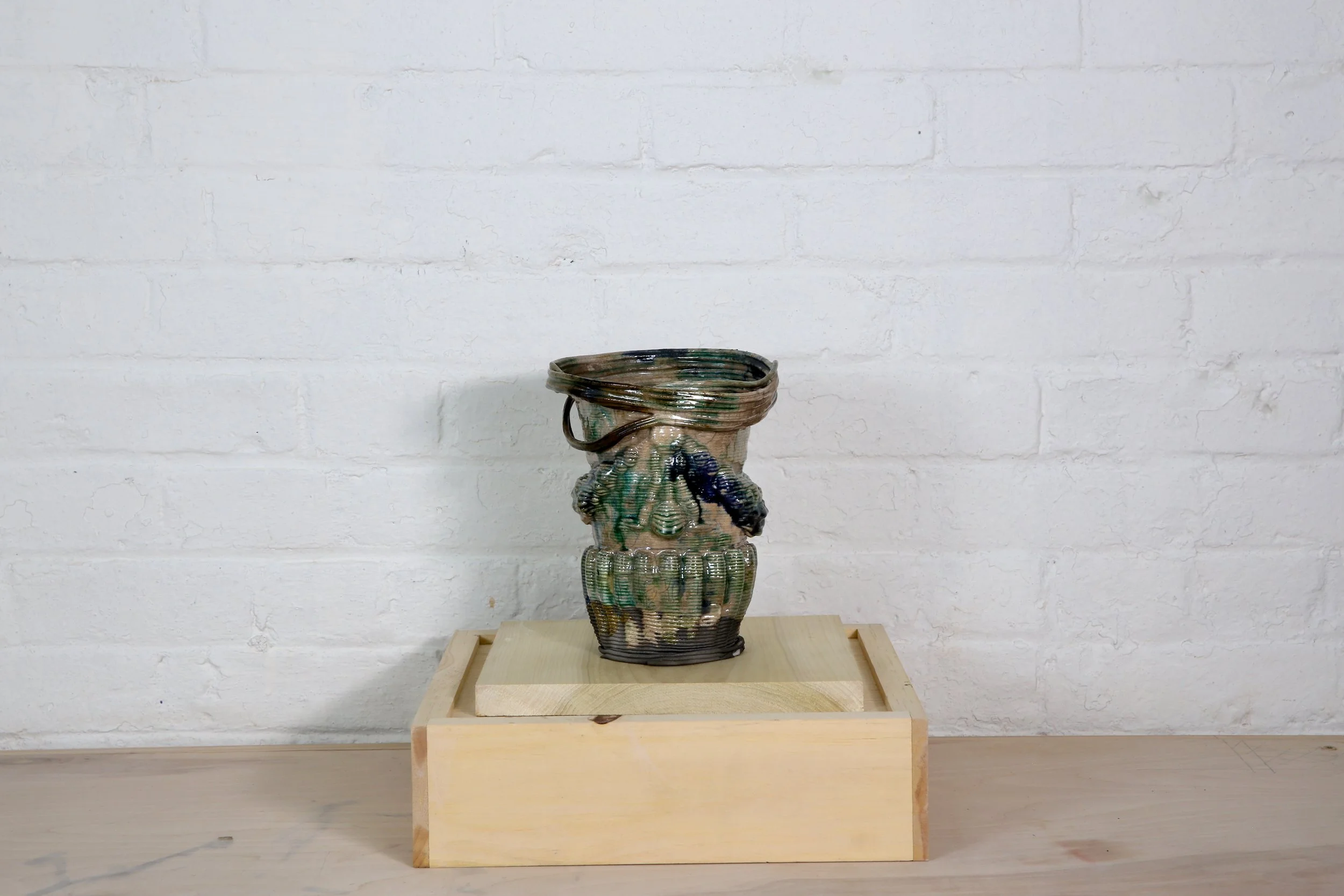 AnaPopescu__WhoIsInLoveandLeaves(Rakublackbottomandgreen)_2024_StonewareGlaze_Raku Fired_19.5x15cm_£750.jpeg