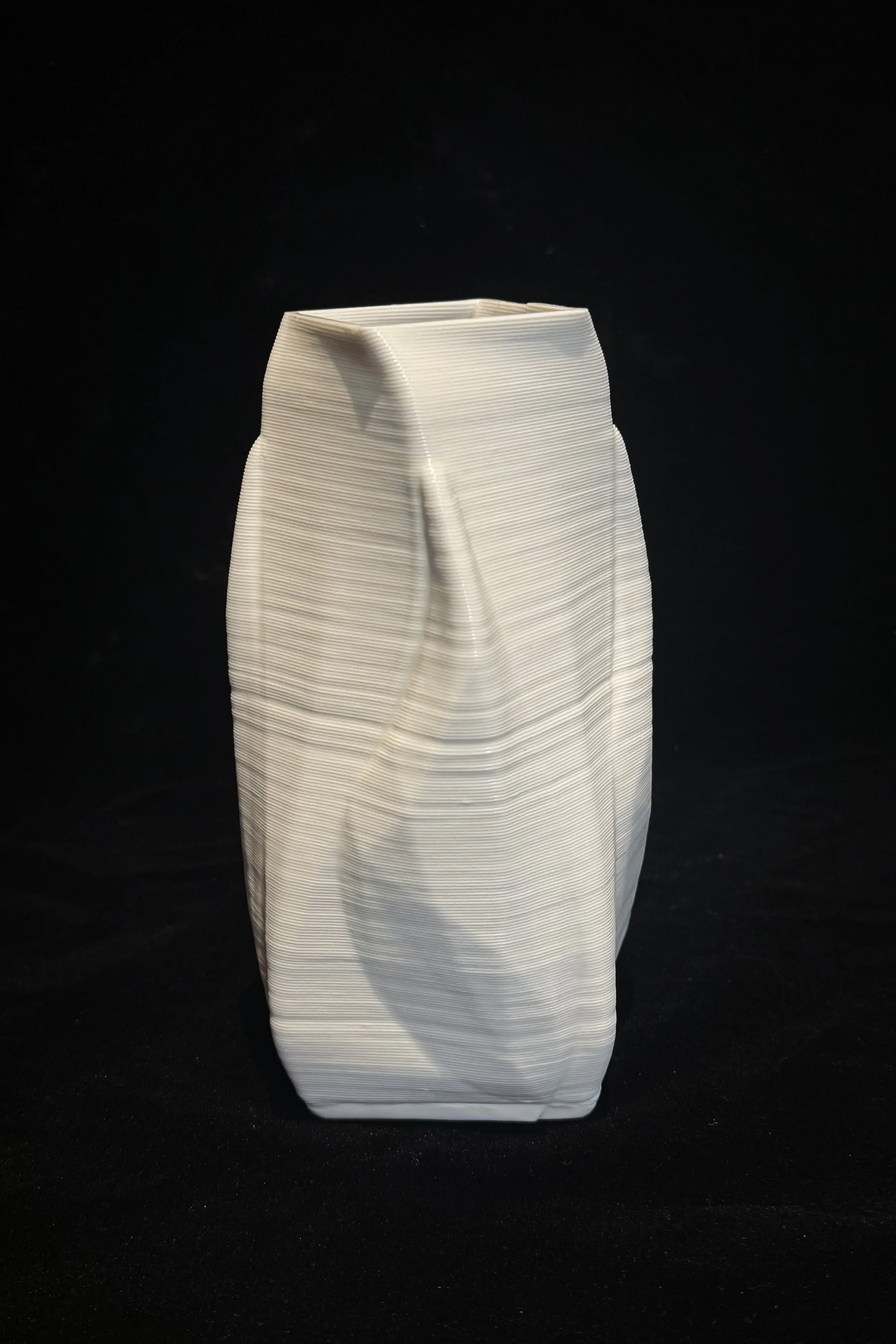 ZixuanZhang_Structure1_2025_GlazedPorcelain_17x7.5x7.5cm_£180.jpg